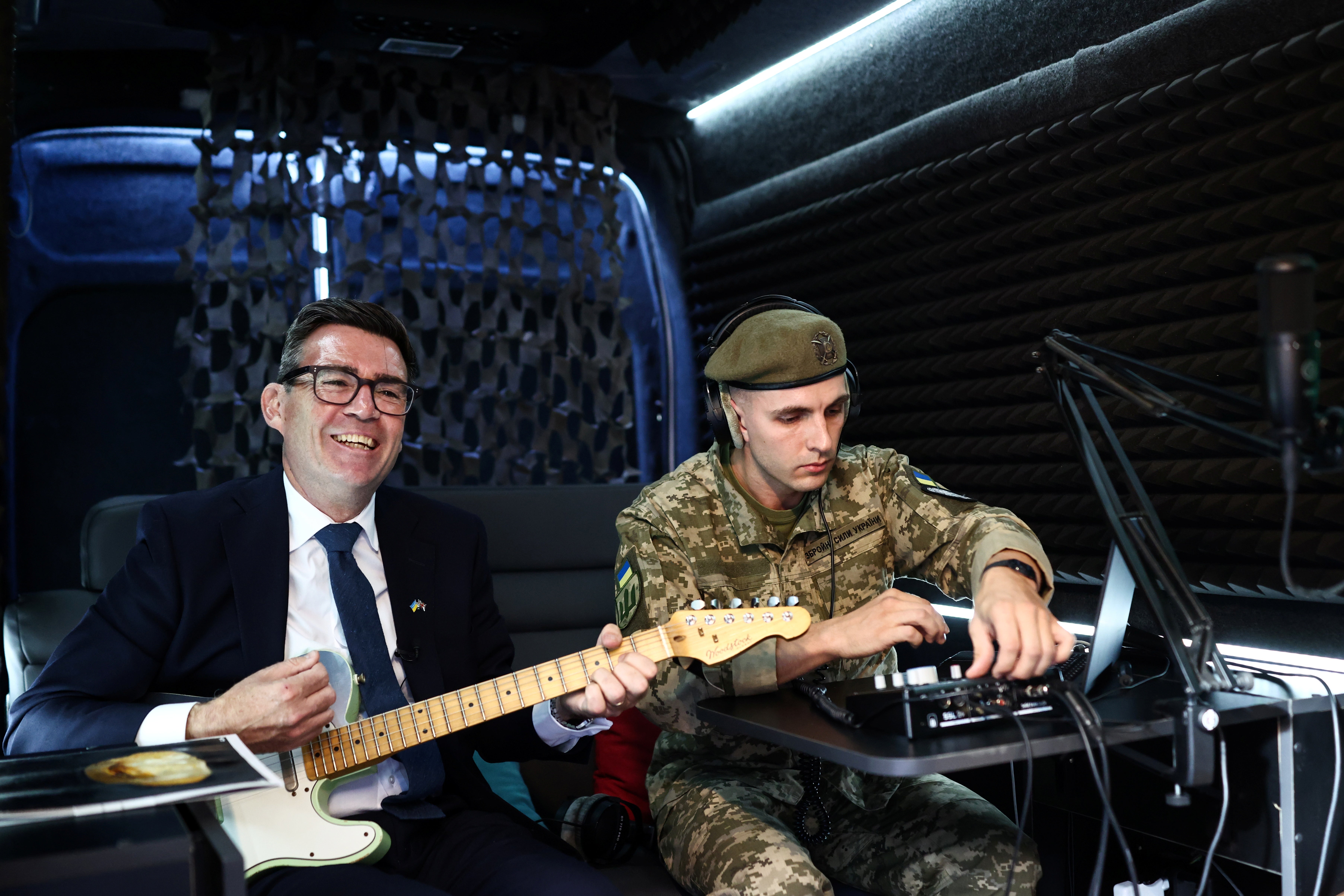 Andy Burnham plays The Smiths with Ukrainian soldiers