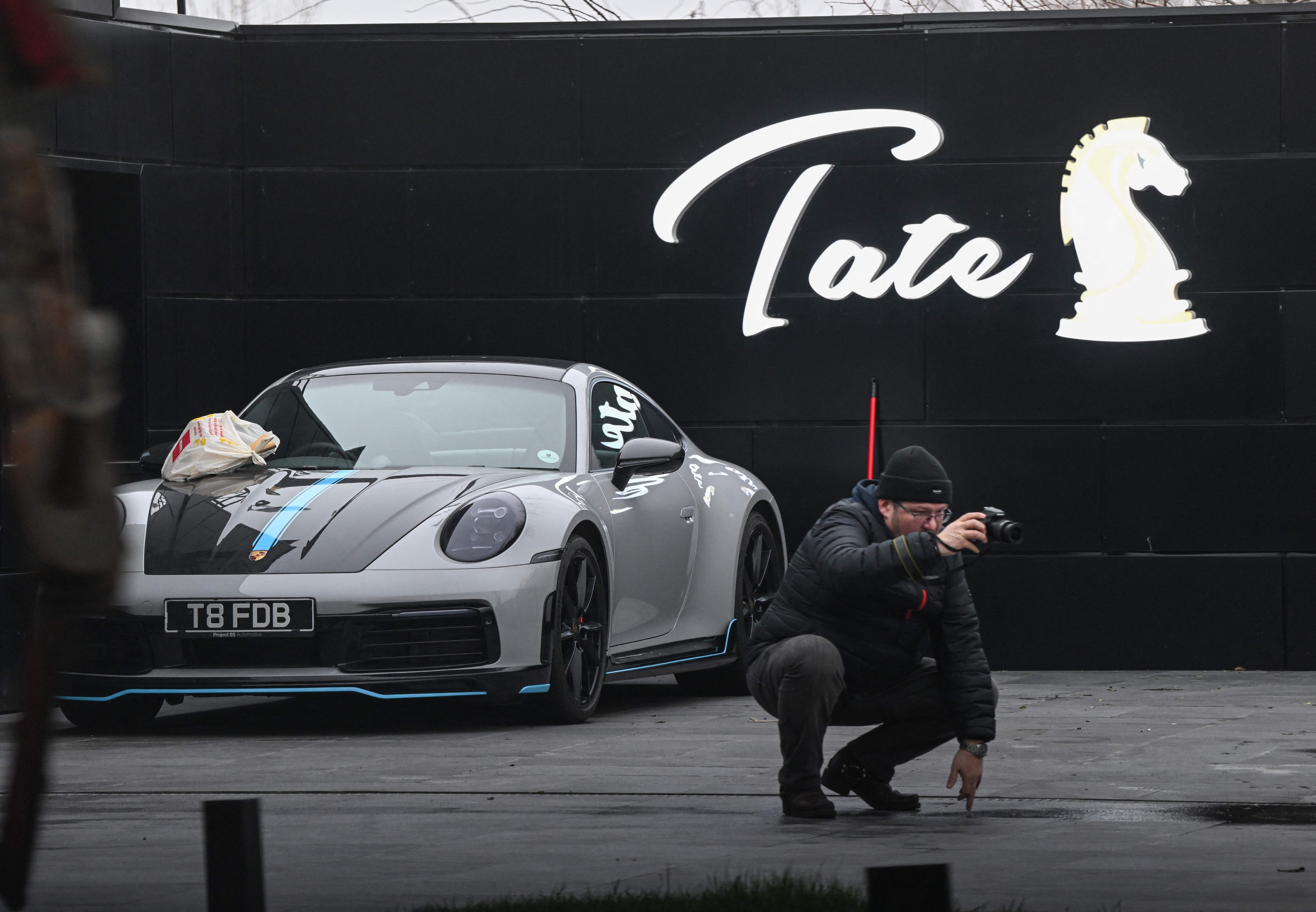 A car is pictured at 'The Hustlers University' site belonging to Andrew Tate and his brother in Bucharest on January 14, 2023