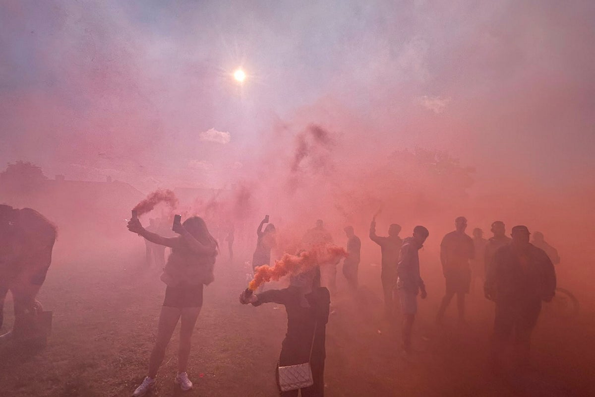 Flares set off and balloons released as hundreds gather for vigil after A66 crash