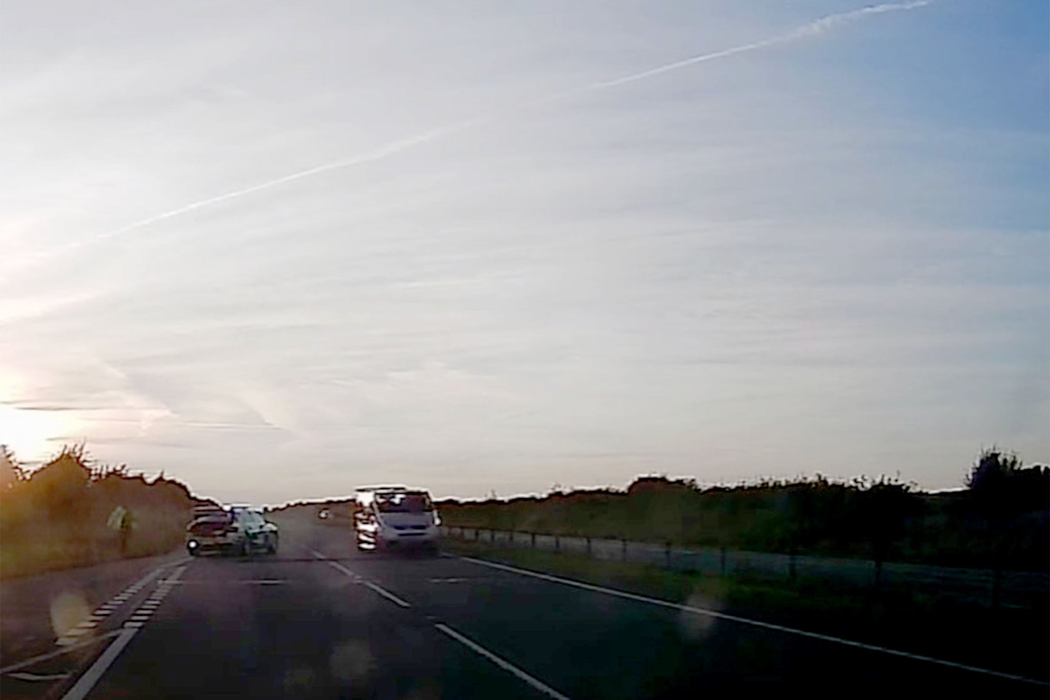 Moment the vehicle goes over the police spike strip