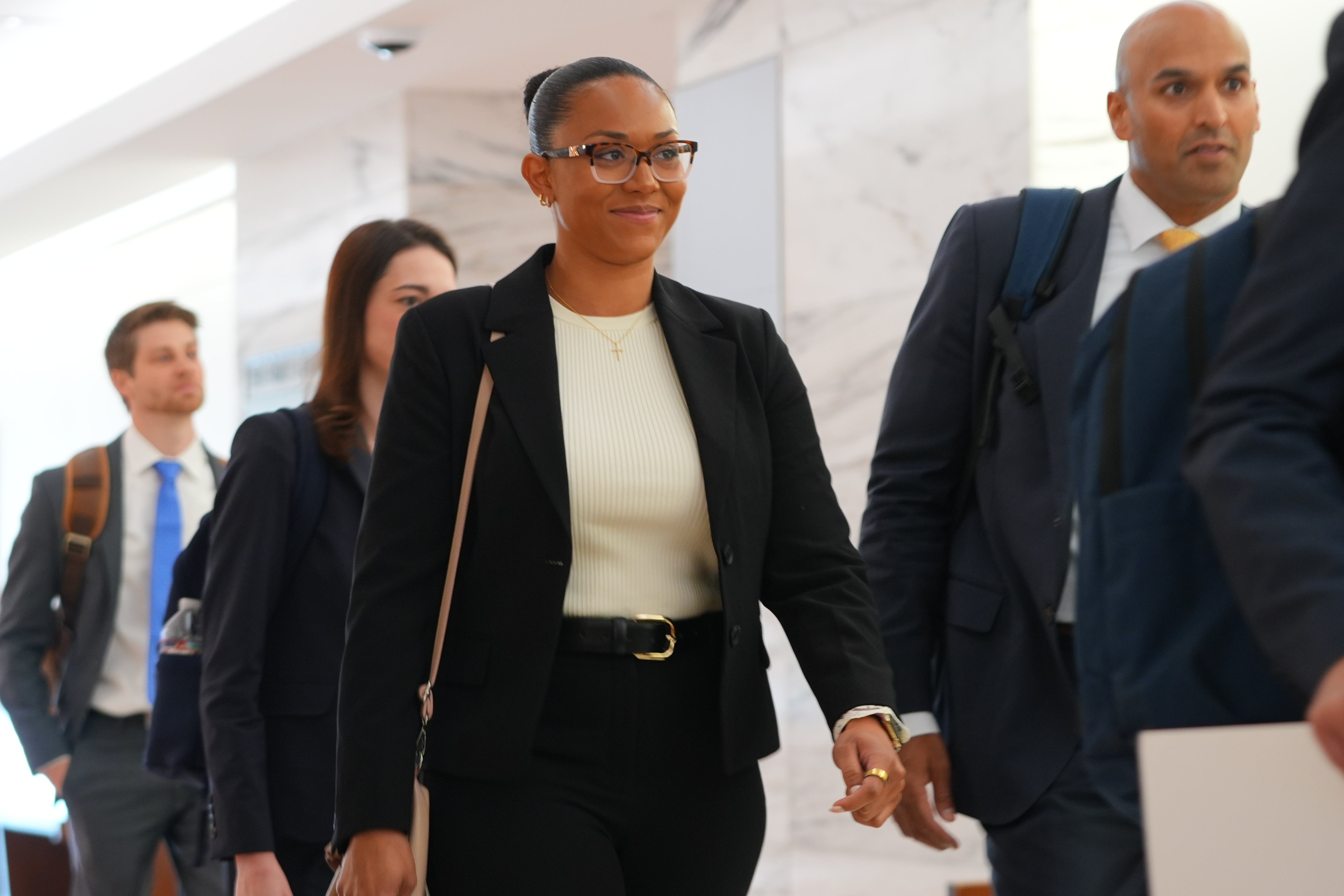 Surrogate McKenna West walking into court