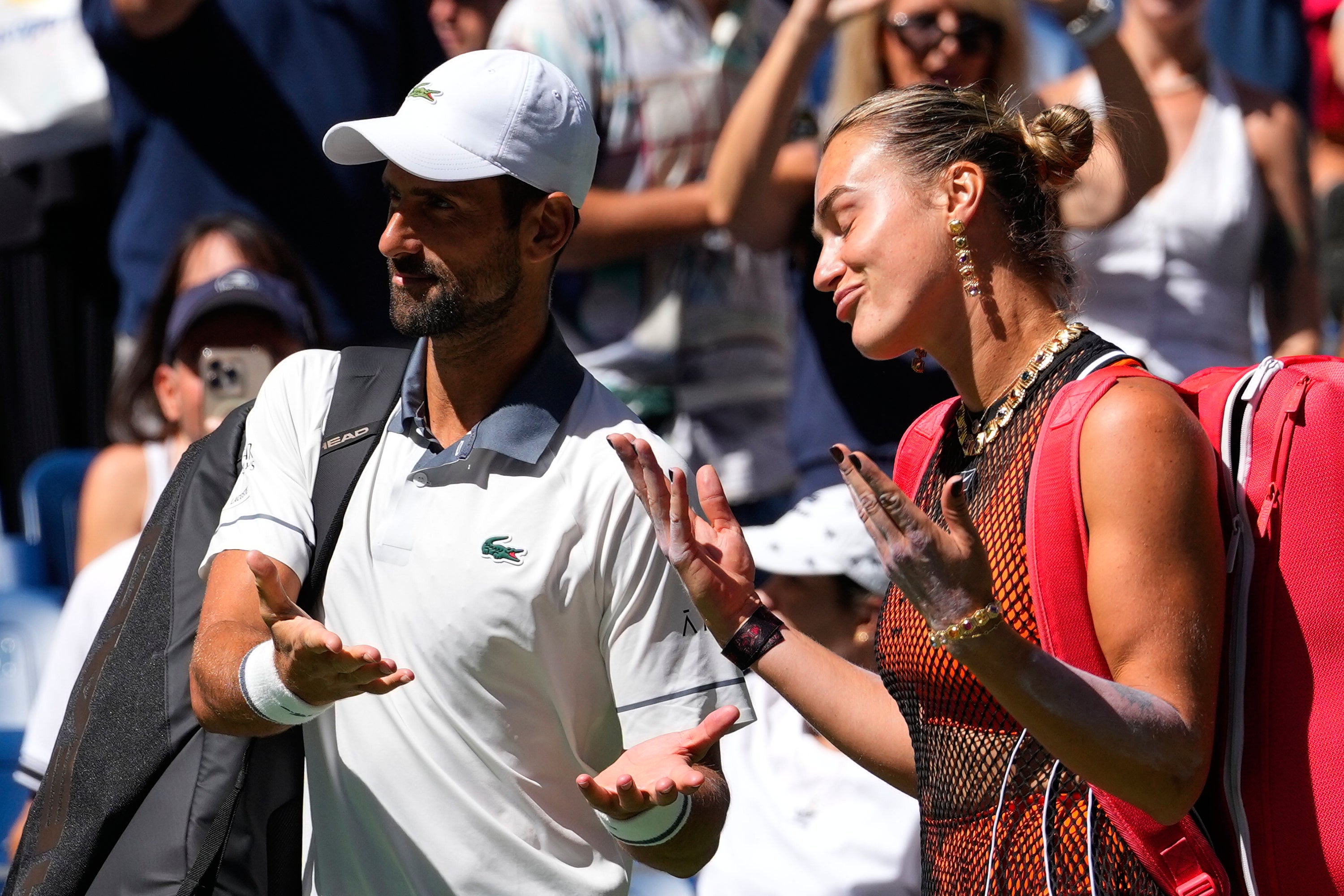 Novak Djokovic and Aryna Sabalenka were beaten in the first round (Yuki Iwamura/AP)