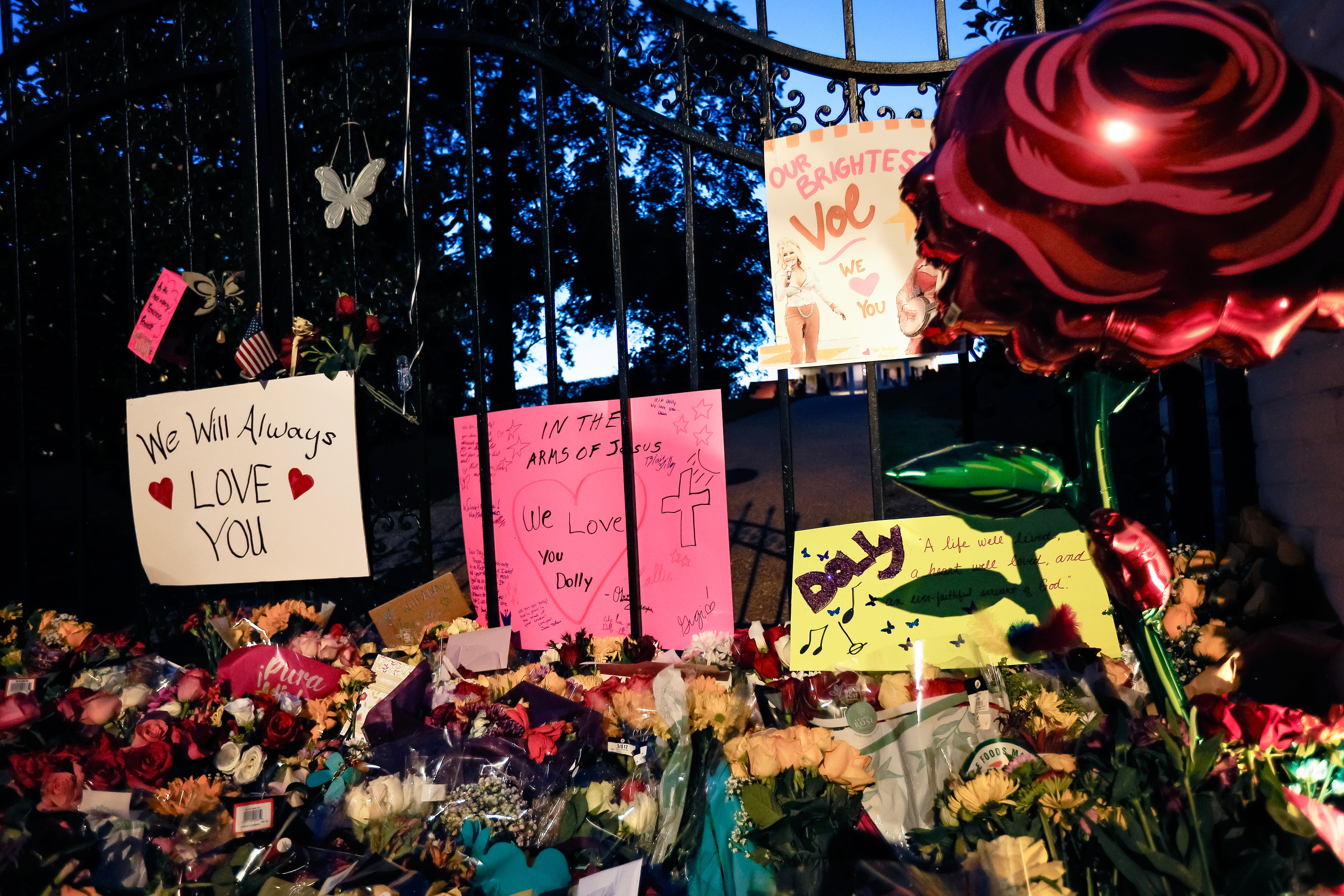 Fans pay tribute to Dolly Parton at her home in Brentwood, Tennessee