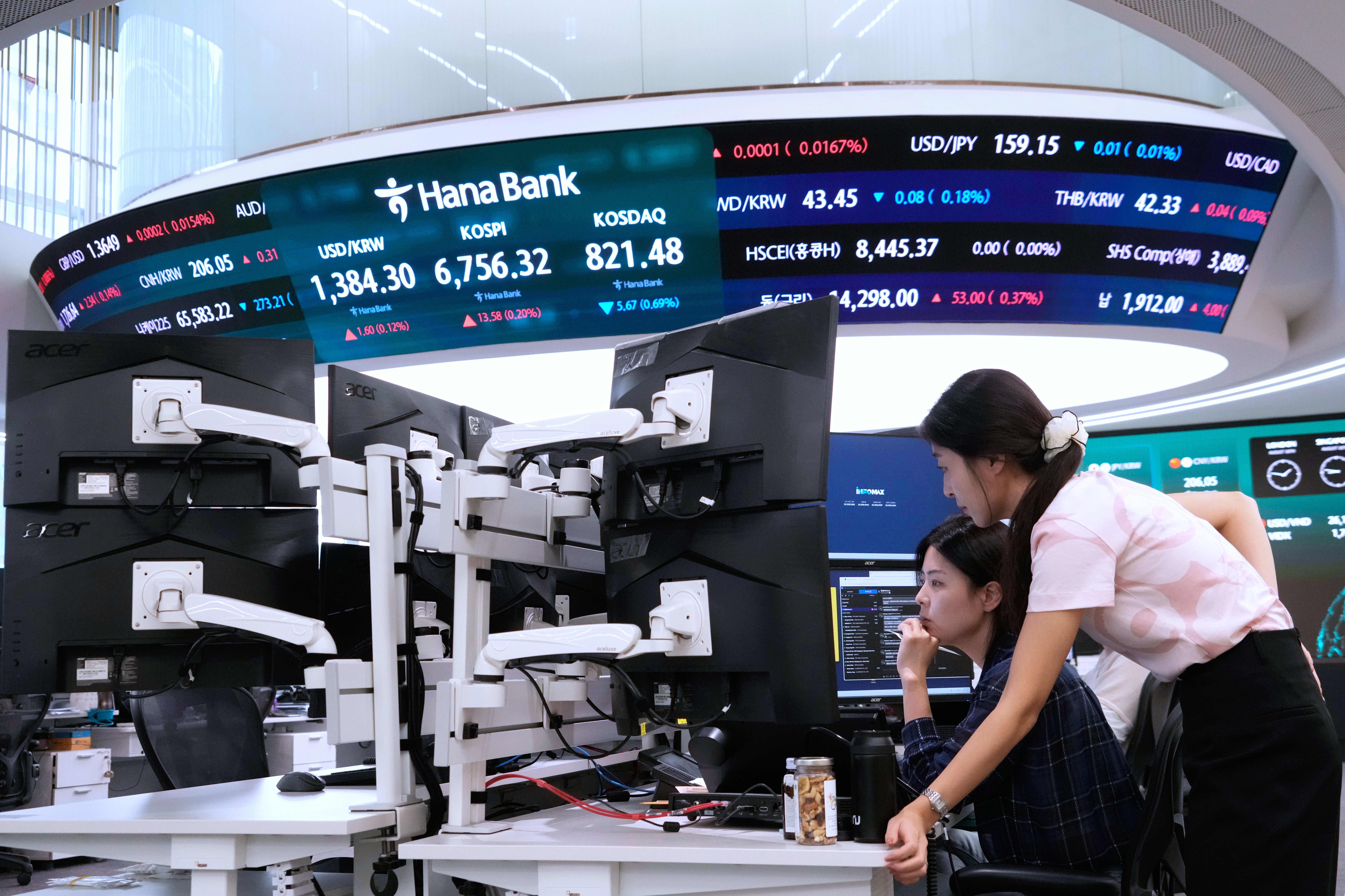 independent.co.uk - Yuri Kageyama - Asian shares mostly rise as oil prices fall and hope grows for AI
