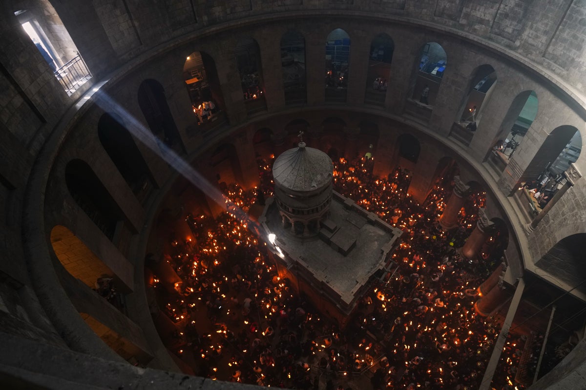 An AP reporter spends the night locked inside Jerusalems holiest church with clergy and pilgrims An AP reporter spends the night locked inside Jerusalems holiest church with clergy and pilgrims