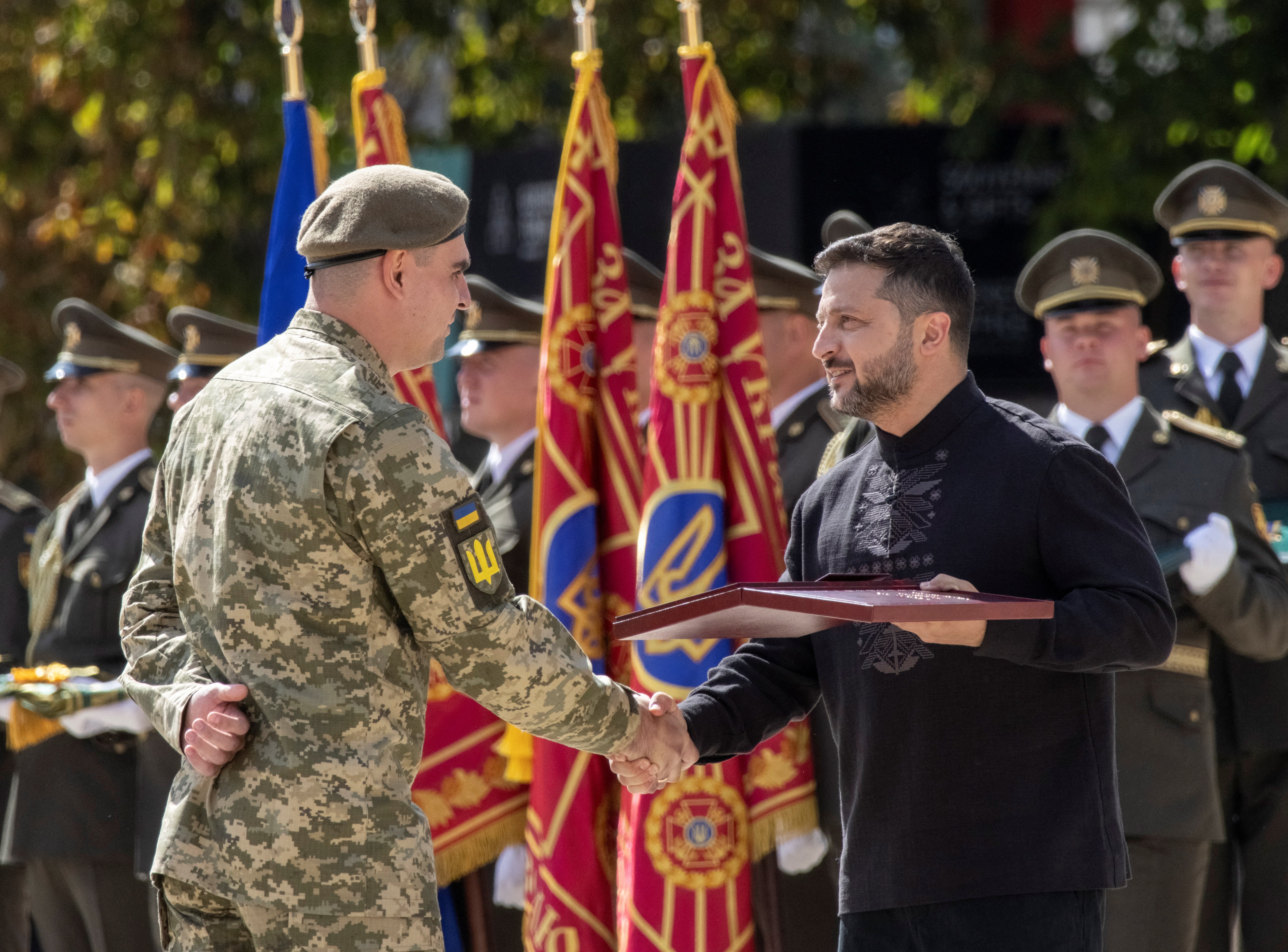 Ukrainian commander Vladyslav Polskyi, 29, receives the nation's highest military honour, the Hero of Ukraine, from Ukraine's President Volodymyr Zelenskiy