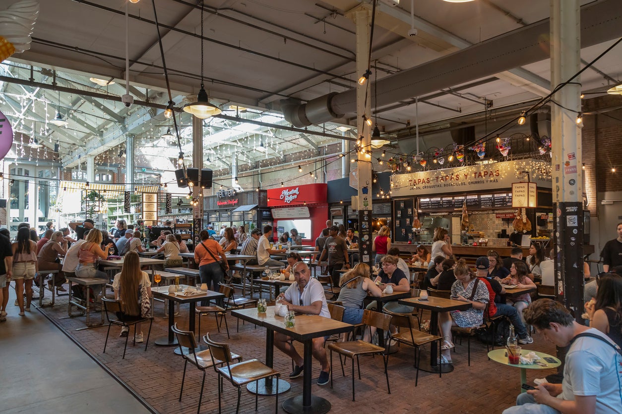 Foodhallen is a popular indoor food market located in a renovated historic tram depot