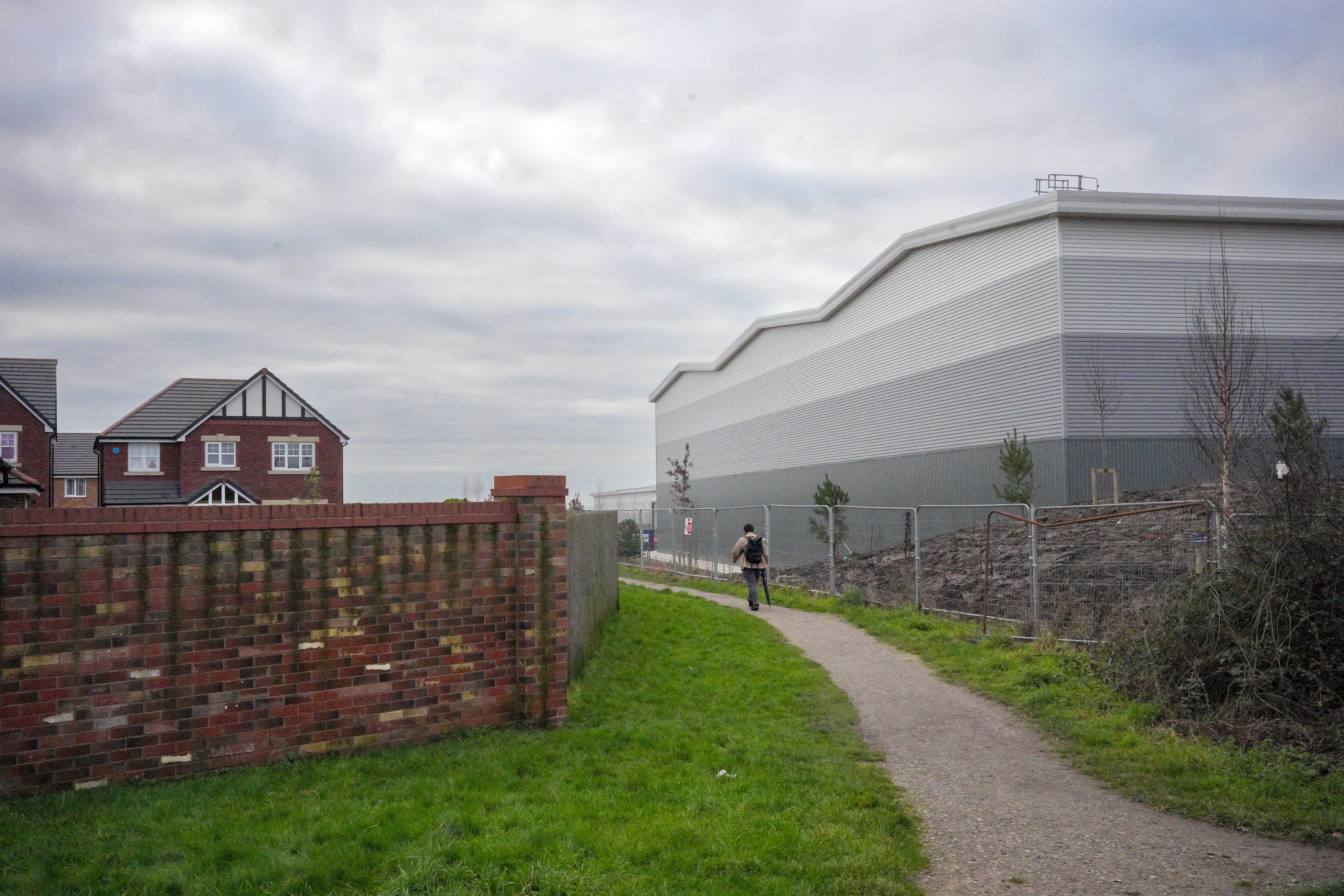 Houses are now dwarfed by the nearby warehouses