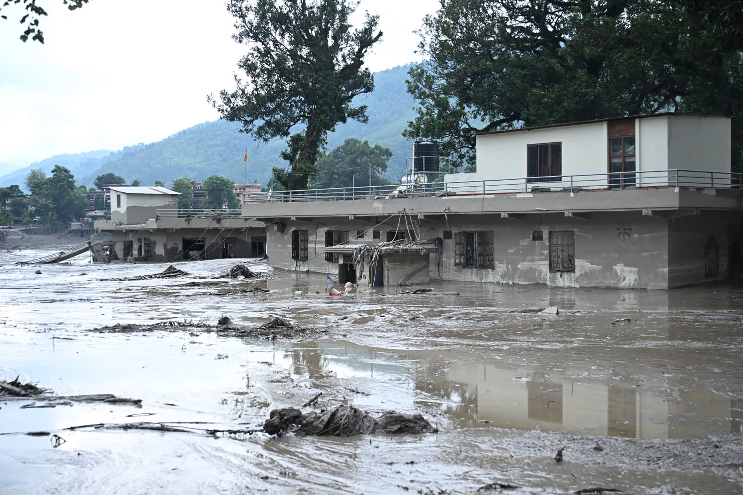 At least 157 people were killed in the floods at the border between China and Nepal (AFP/Getty)