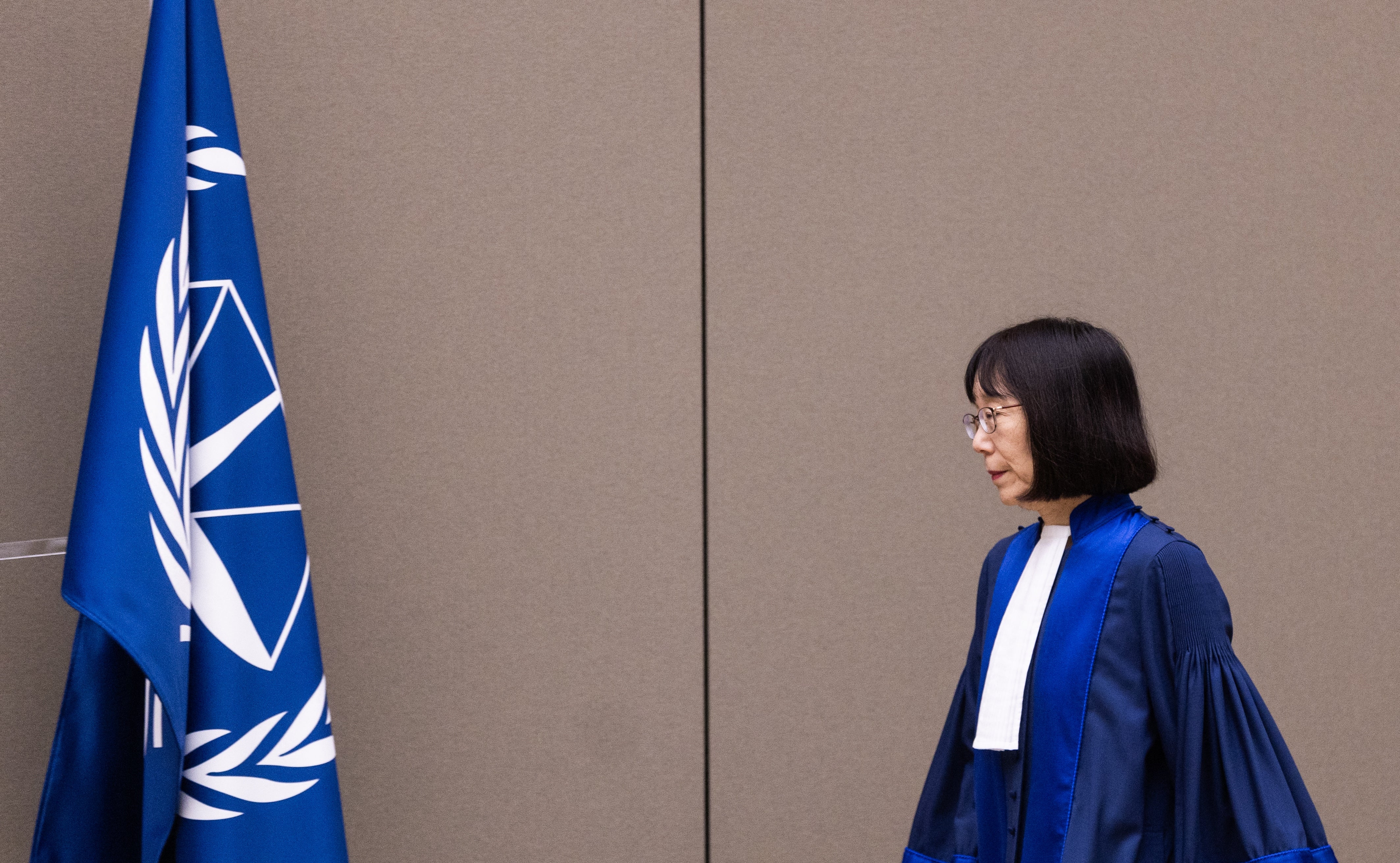 Judge Tomoko Akane arrives prior to the announcement of an ICC verdict