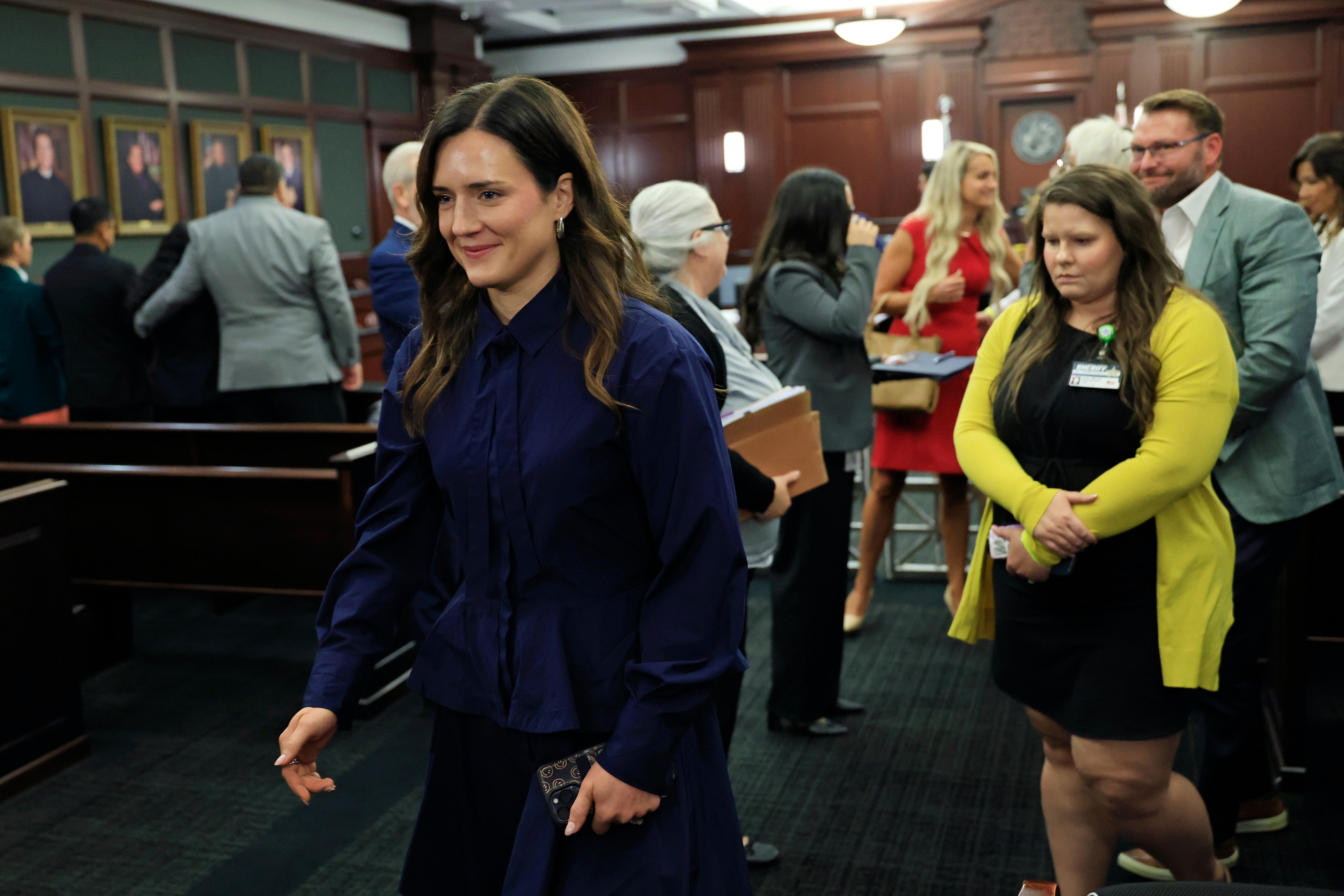 Kirsten Bridegan, widow of Jared Bridegan, reacts after the guilty verdict