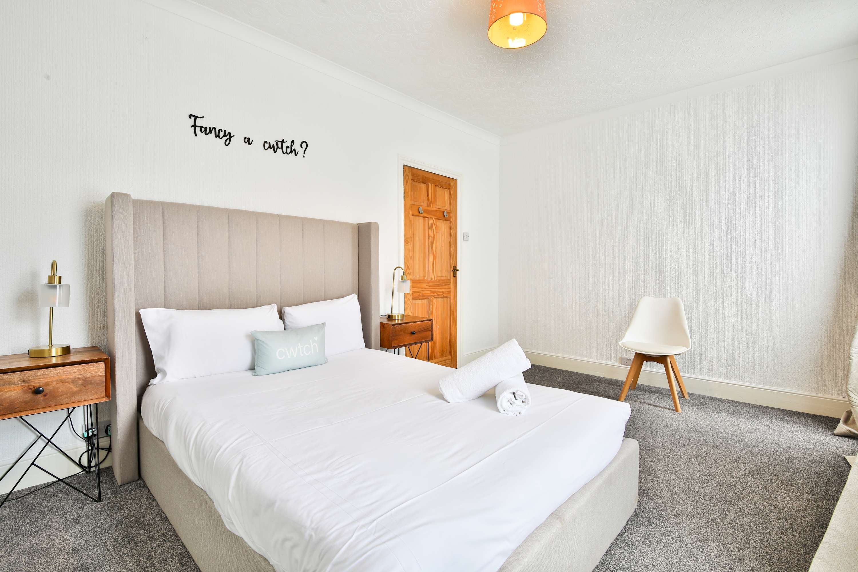 The Airbnb features two bedrooms and a sofa bed