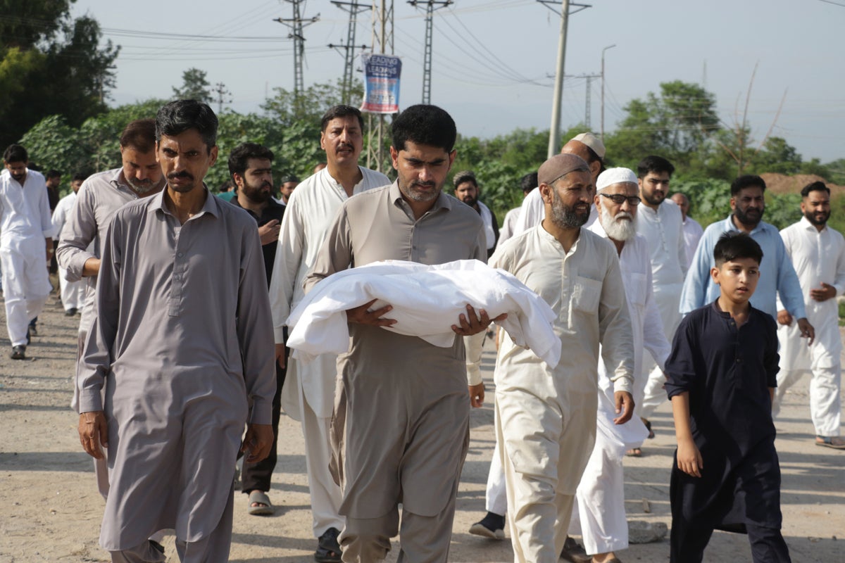 Pakistani investigators visiting hospital nursery where fire killed 14 newborns