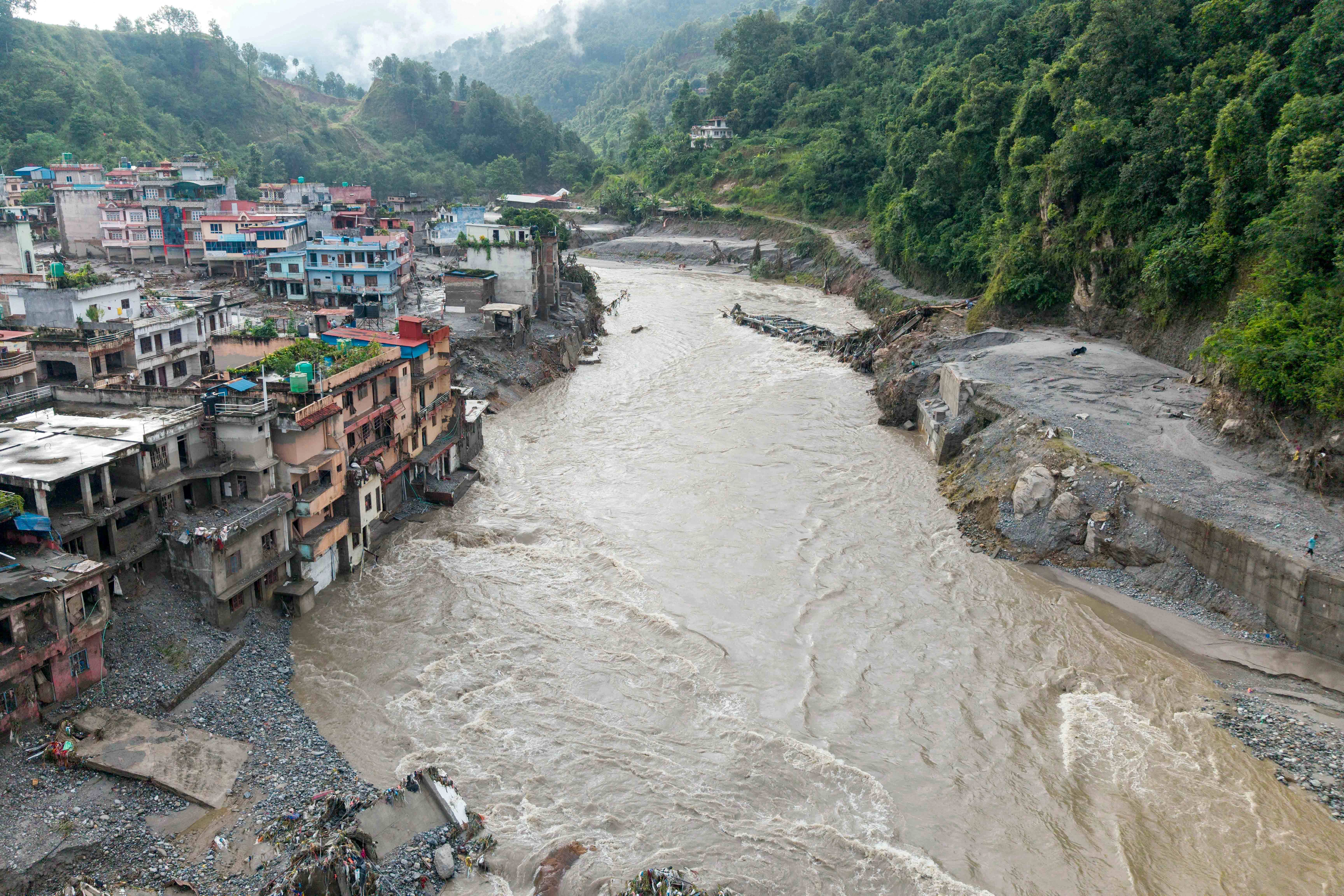 Houses lying in mud after the flash floods at Devighat, Bidur Municipality in Nepal's Nuwakot district