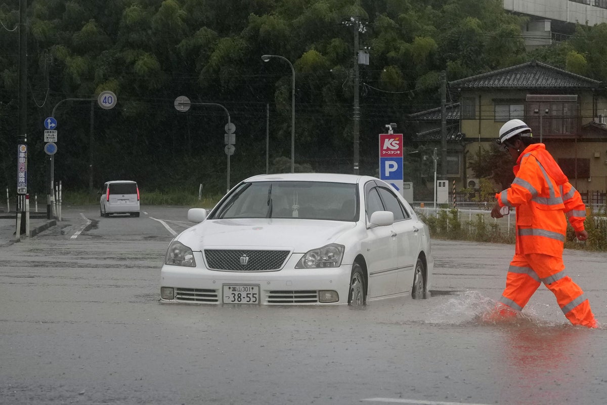 Torrential rain causes flooding and travel disruptions in north-central Japan