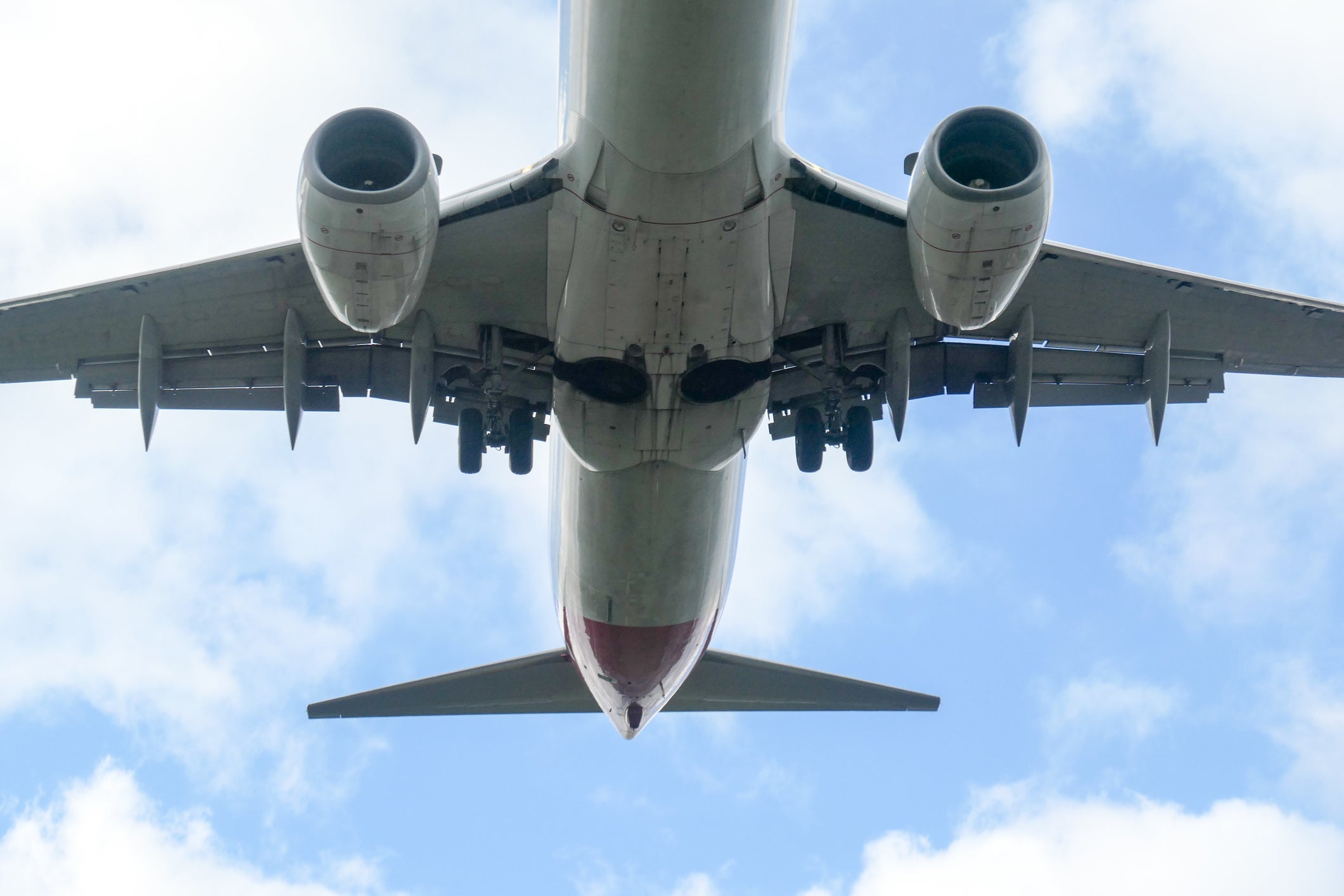Unidentified body found in wheel well of flight from Japan