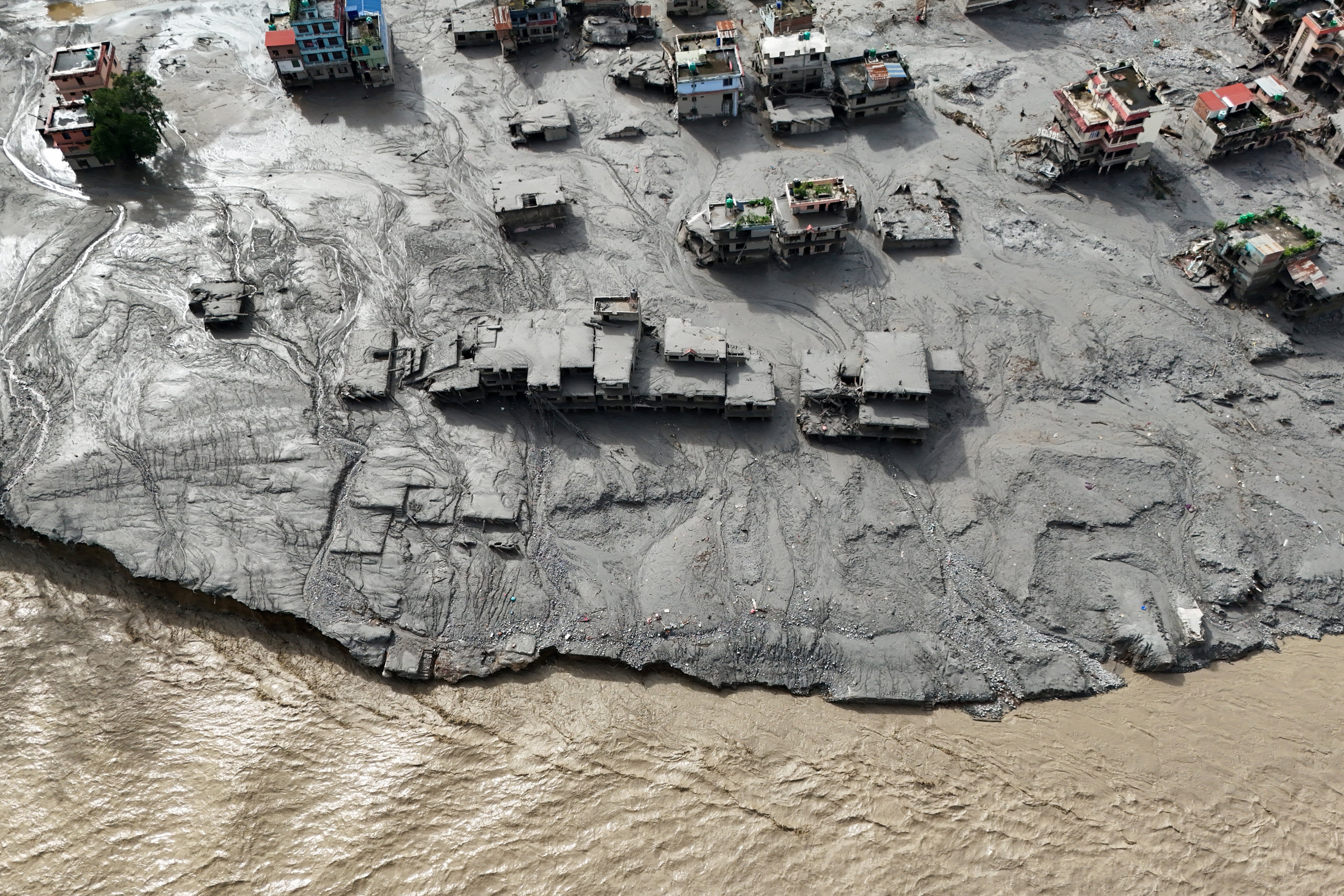 Mud covers buildings in Trishuli