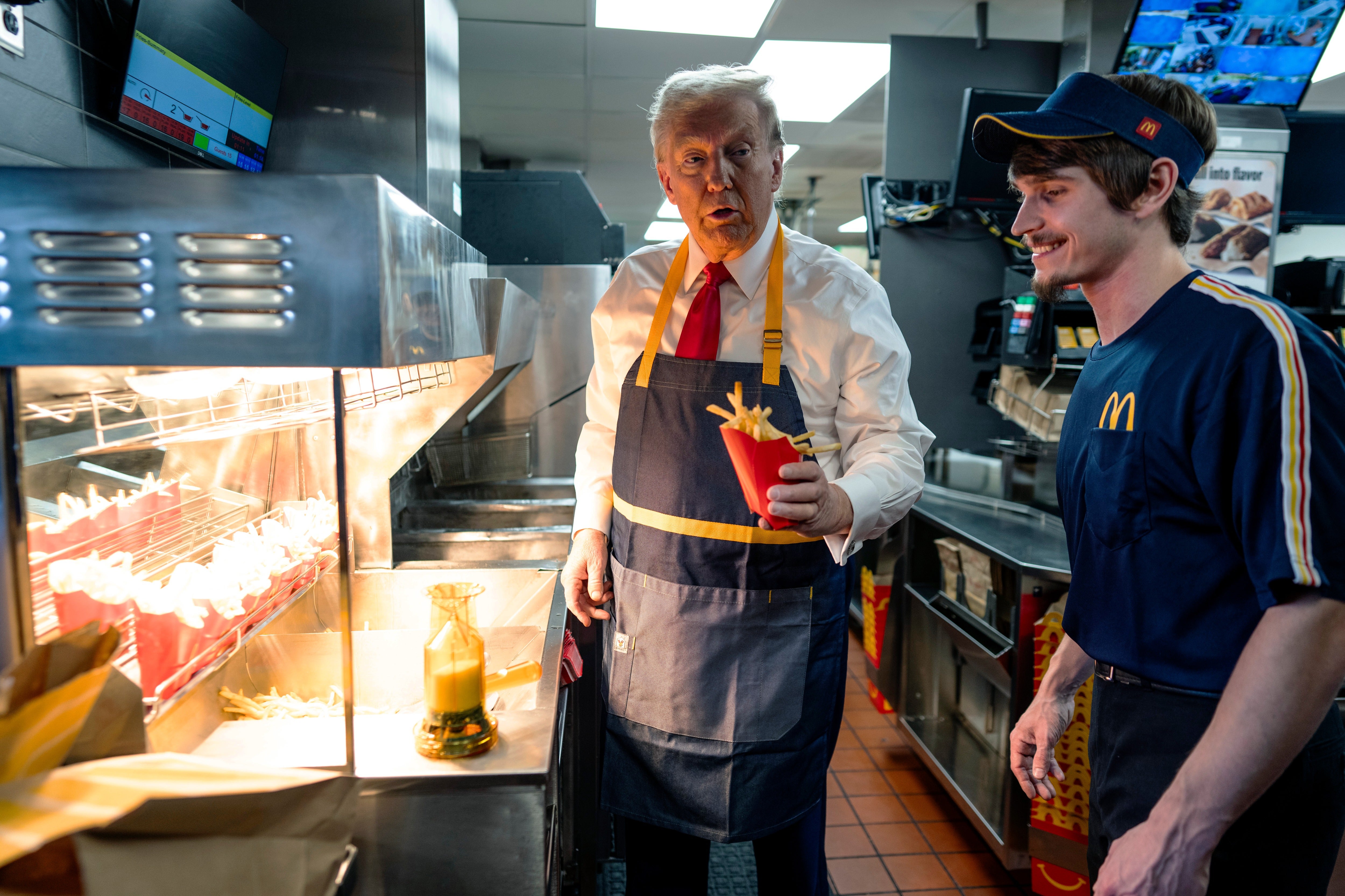 <p>Burger King executive Tom Curtis asked President Donald Trump to stop 'having photo ops in the competitors' restaurants and come to ours more often'</p>