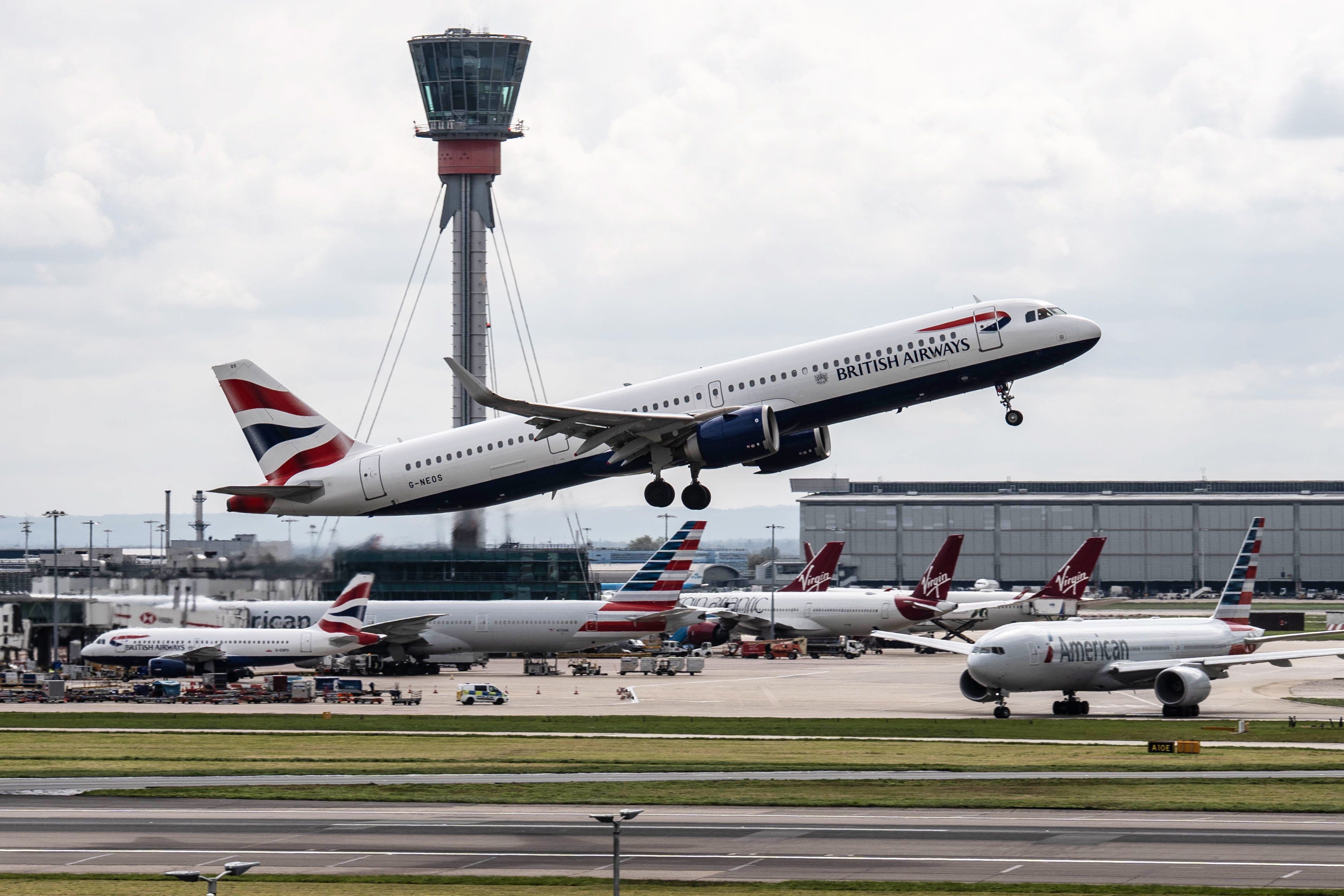 British Airways is being sued by a passenger who says a water bottle fell on her head during a flight and permanently affected her eyesight