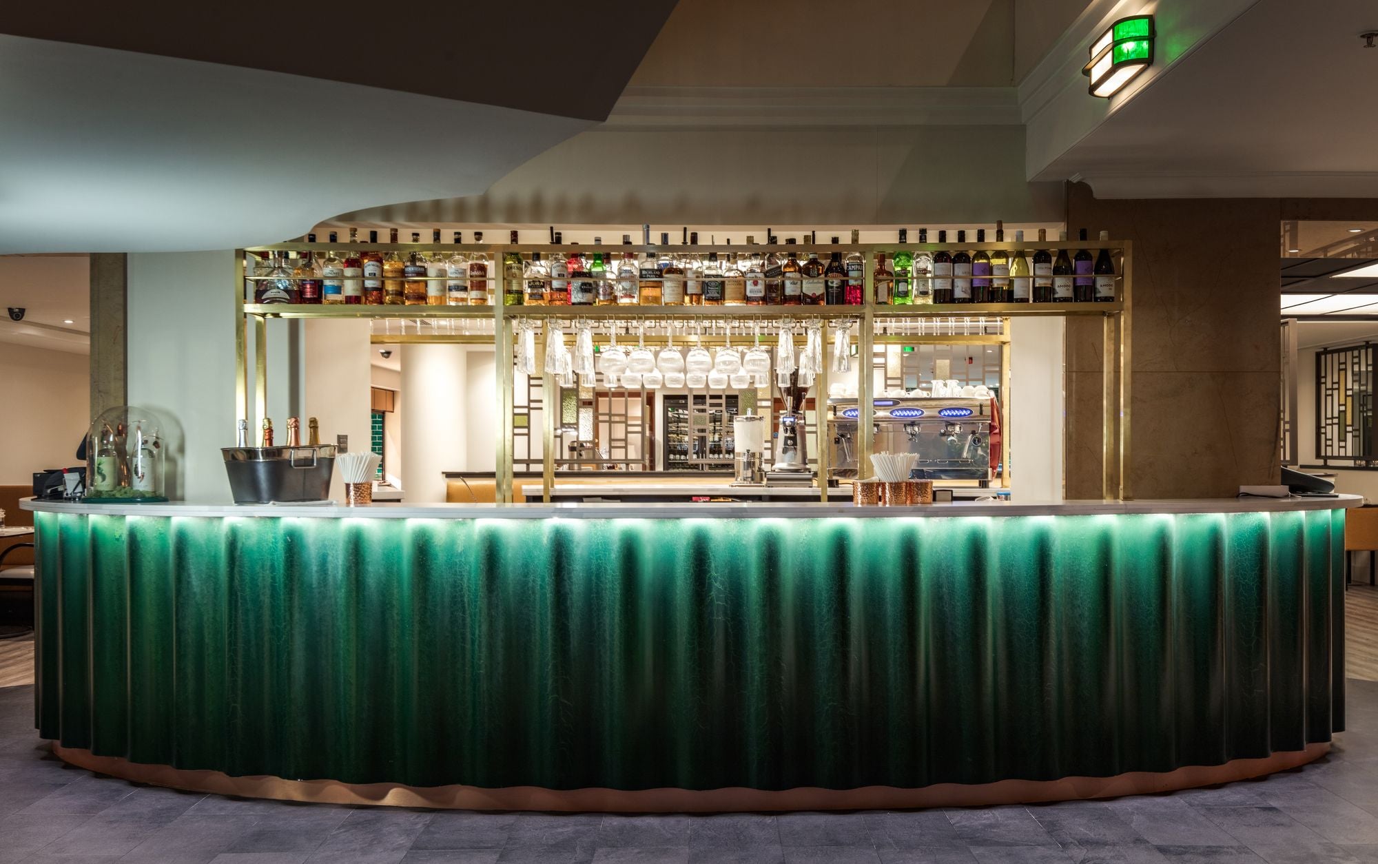 The hotel’s vibrant green bar is another Art Deco-inspired feature