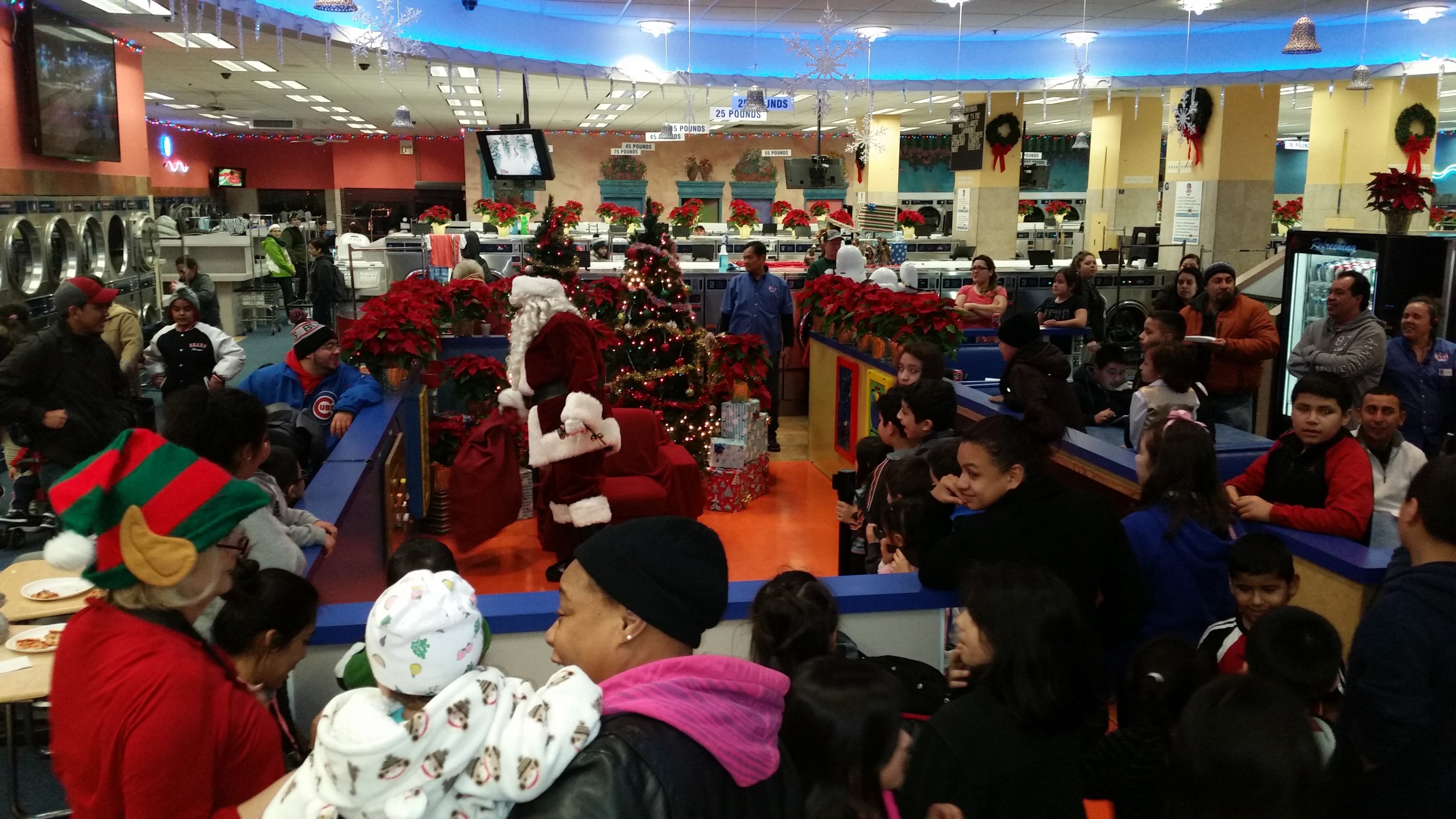 The laundromat offers free pizza and donuts for customers and fun perks for kids like a visit from Santa in December. The laundromat has seen a total of up to 250 people in the store at once, including children