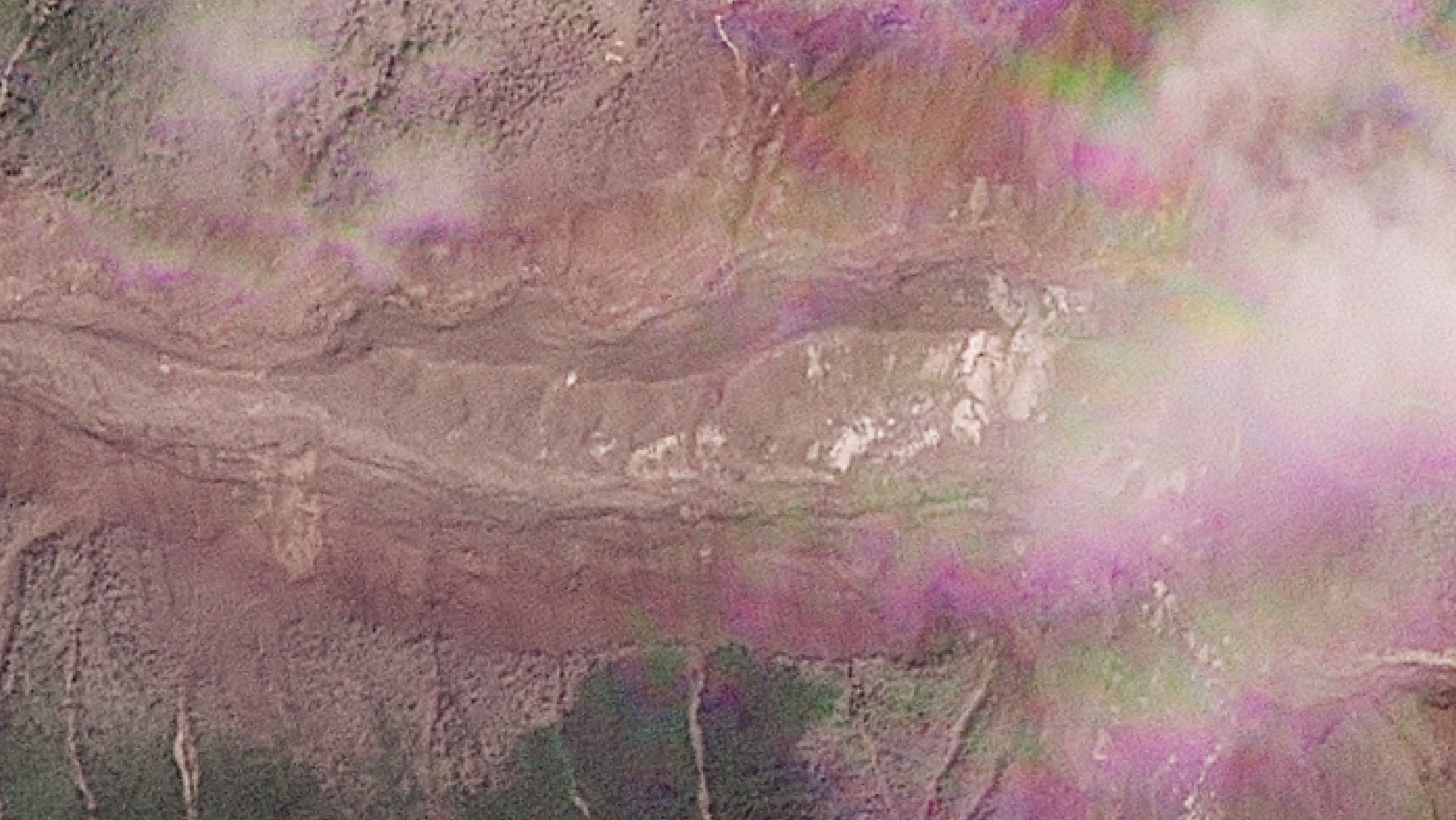 A satellite view shows a buildup of a lake at the site of the glacier collapse
