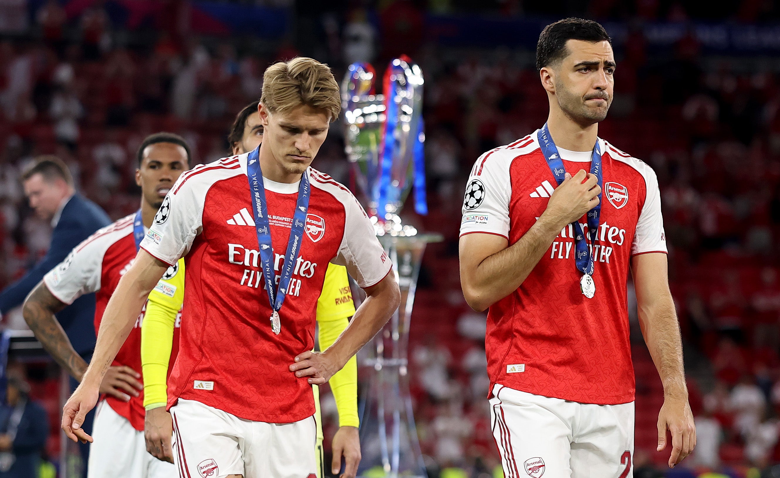 Martin Odegaard (left) and Mikel Merino react to their defeat in the 25/26 Champions League final