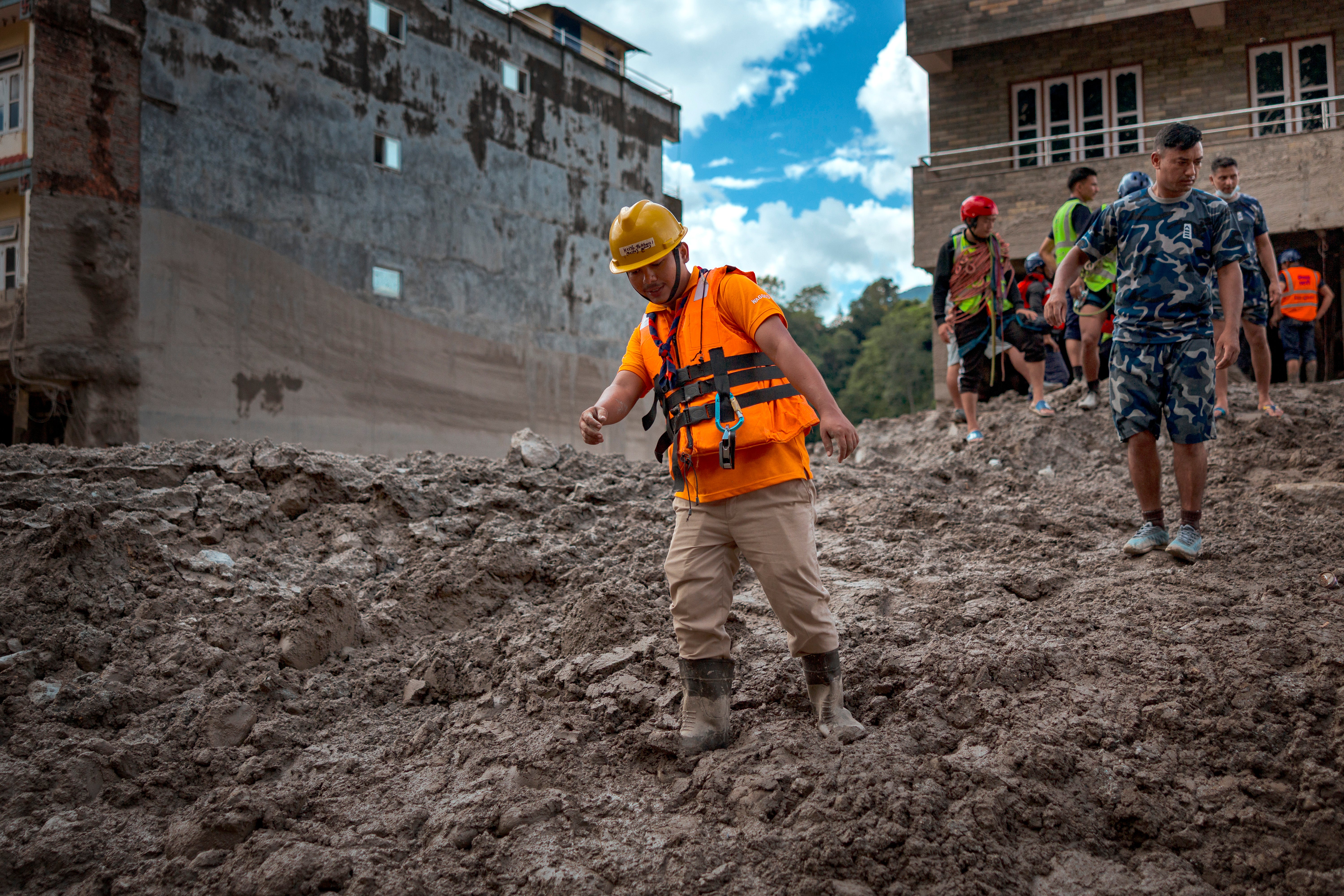 Rescuers search for survivors following flash floods in Trishuli, Nepal