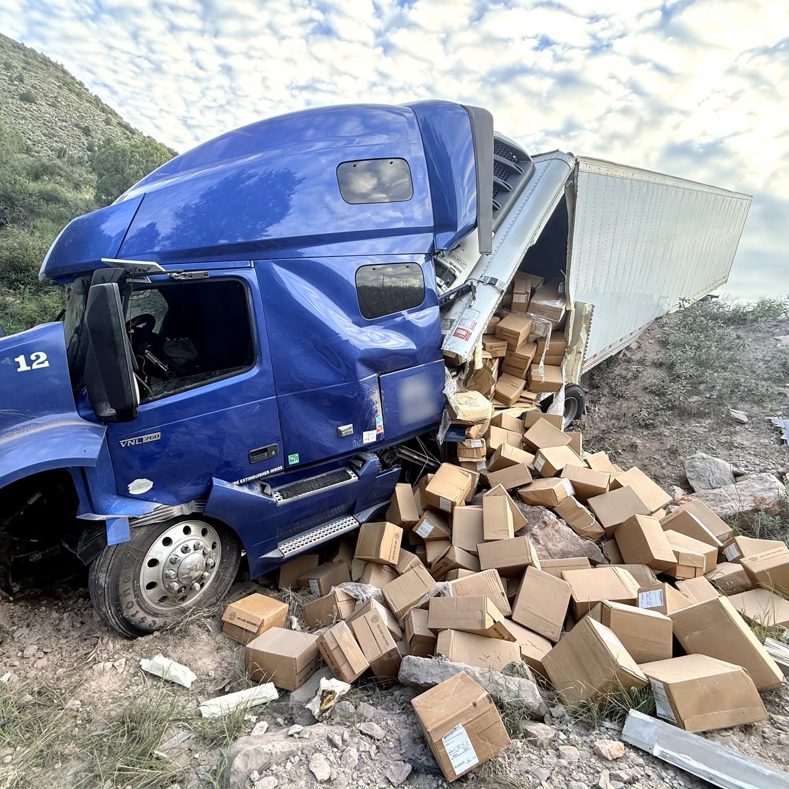 The truck driver, who was transporting around 40,000 pounds of cheese, said he swerved to avoid hitting an animal (Arizona Department of Public Safety)