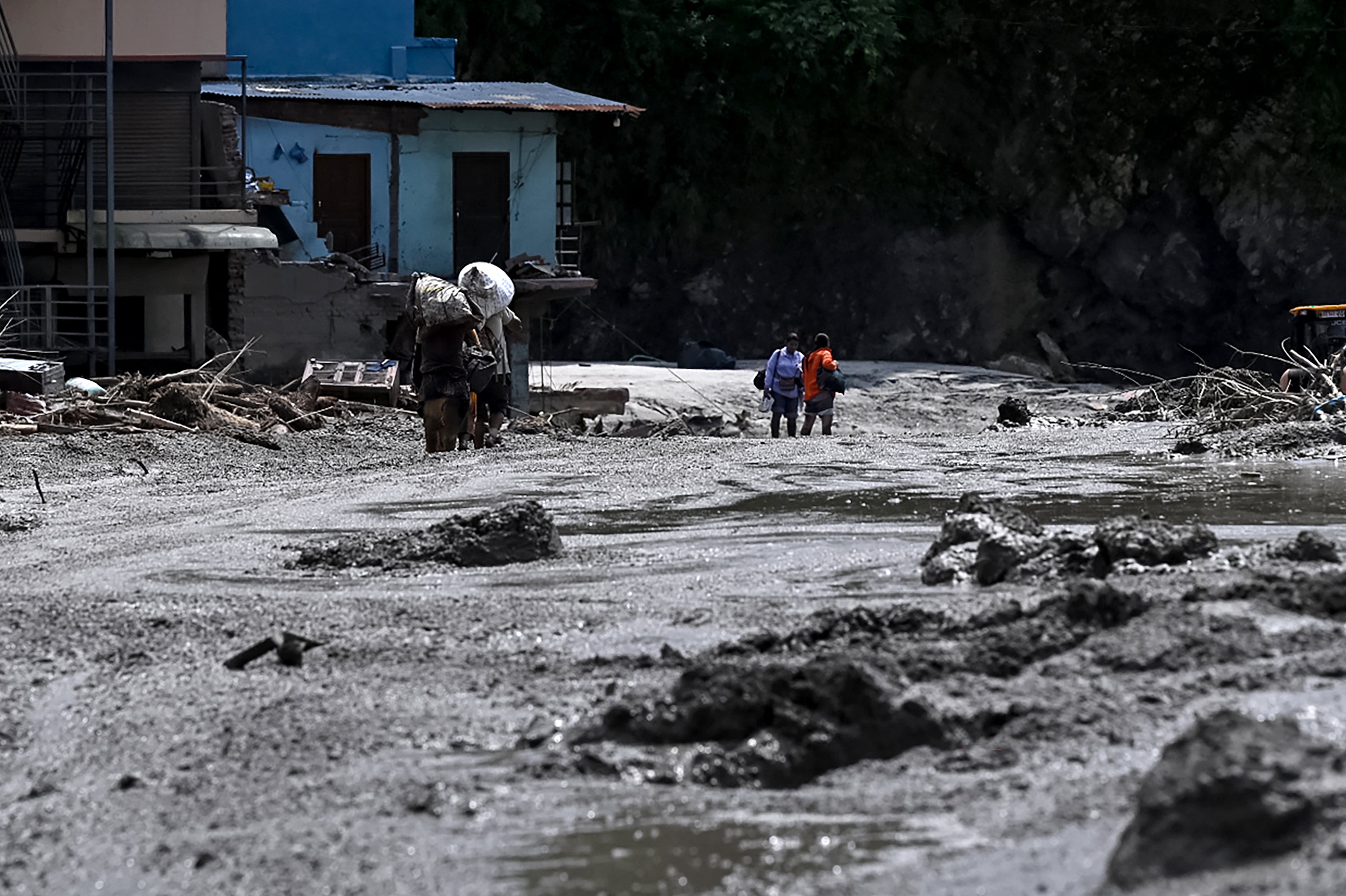 Rescue efforts continue after flooding in the Rasuwa district, which borders China’s autonomous region of Tibet