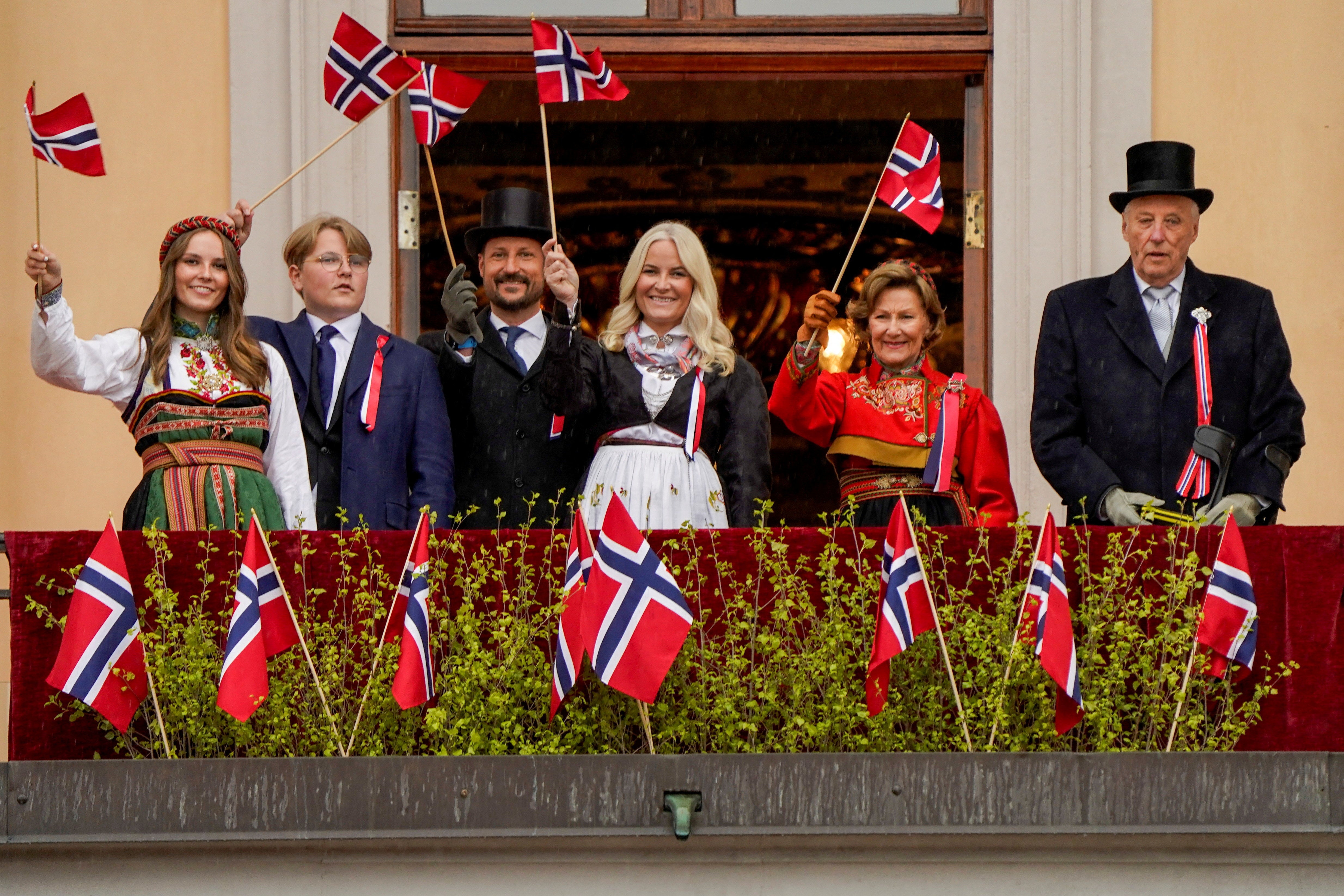 Harald, right, with his family in 2021: Queen Sonja, Crown Prince Haakon, Crown Princess Mette-Marit, Princess Ingrid Alexandra and Prince Sverre Magnus