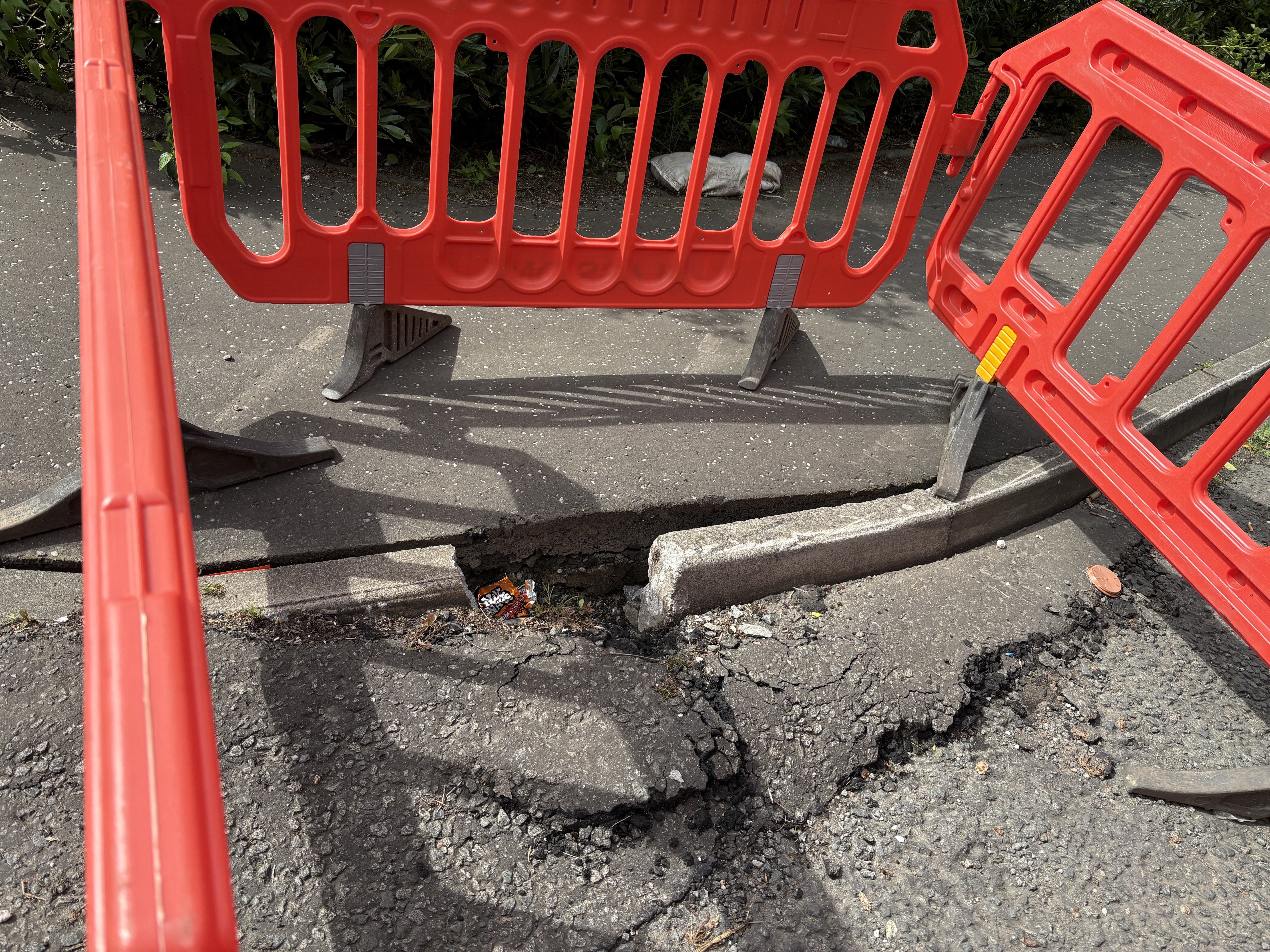 The ground movement has seen cracks appear in roads, paths and gardens, as well as damage to some properties in the village