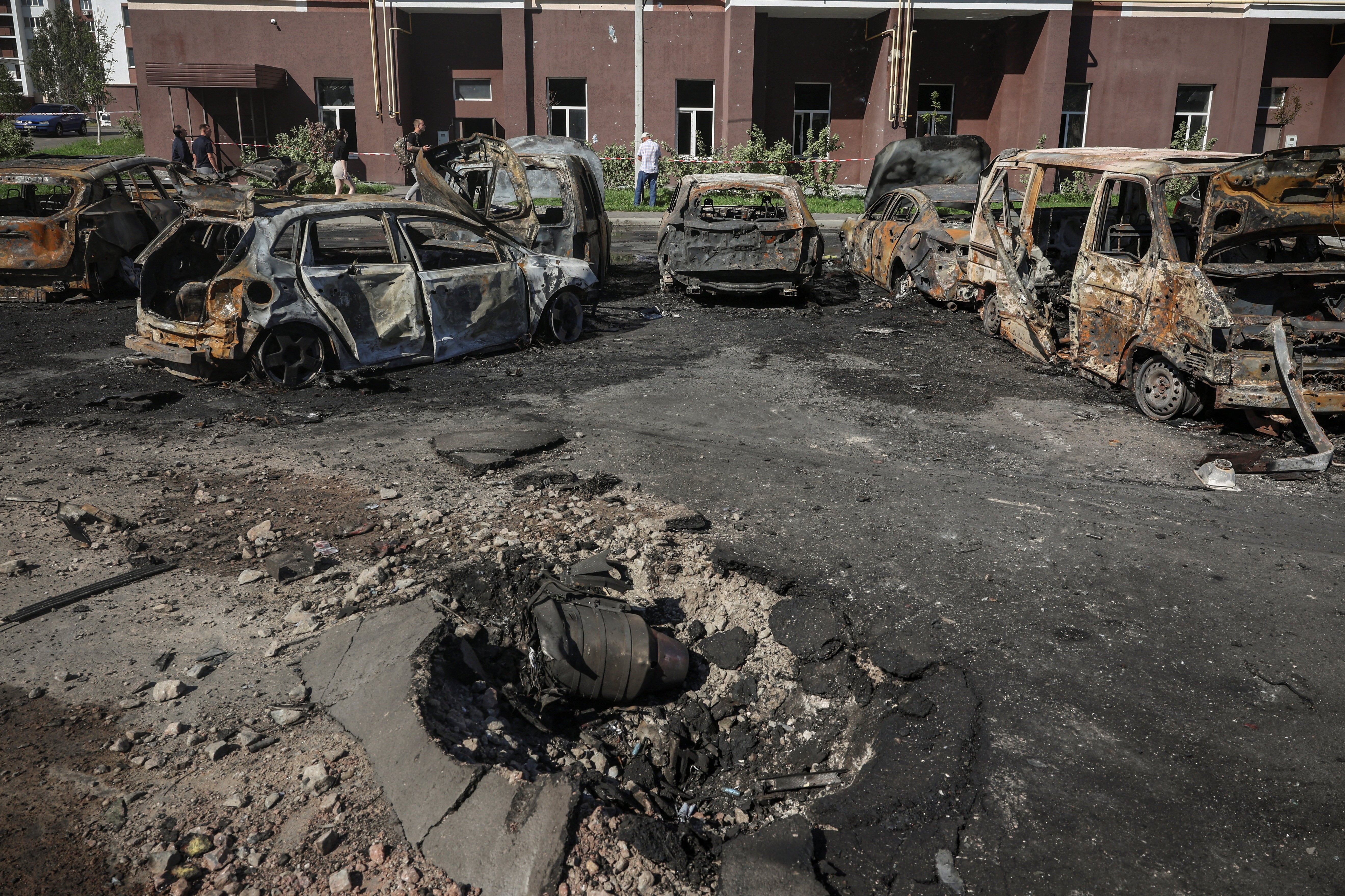 Parts of a shot-down kamikaze drone at a site of a Russian strike