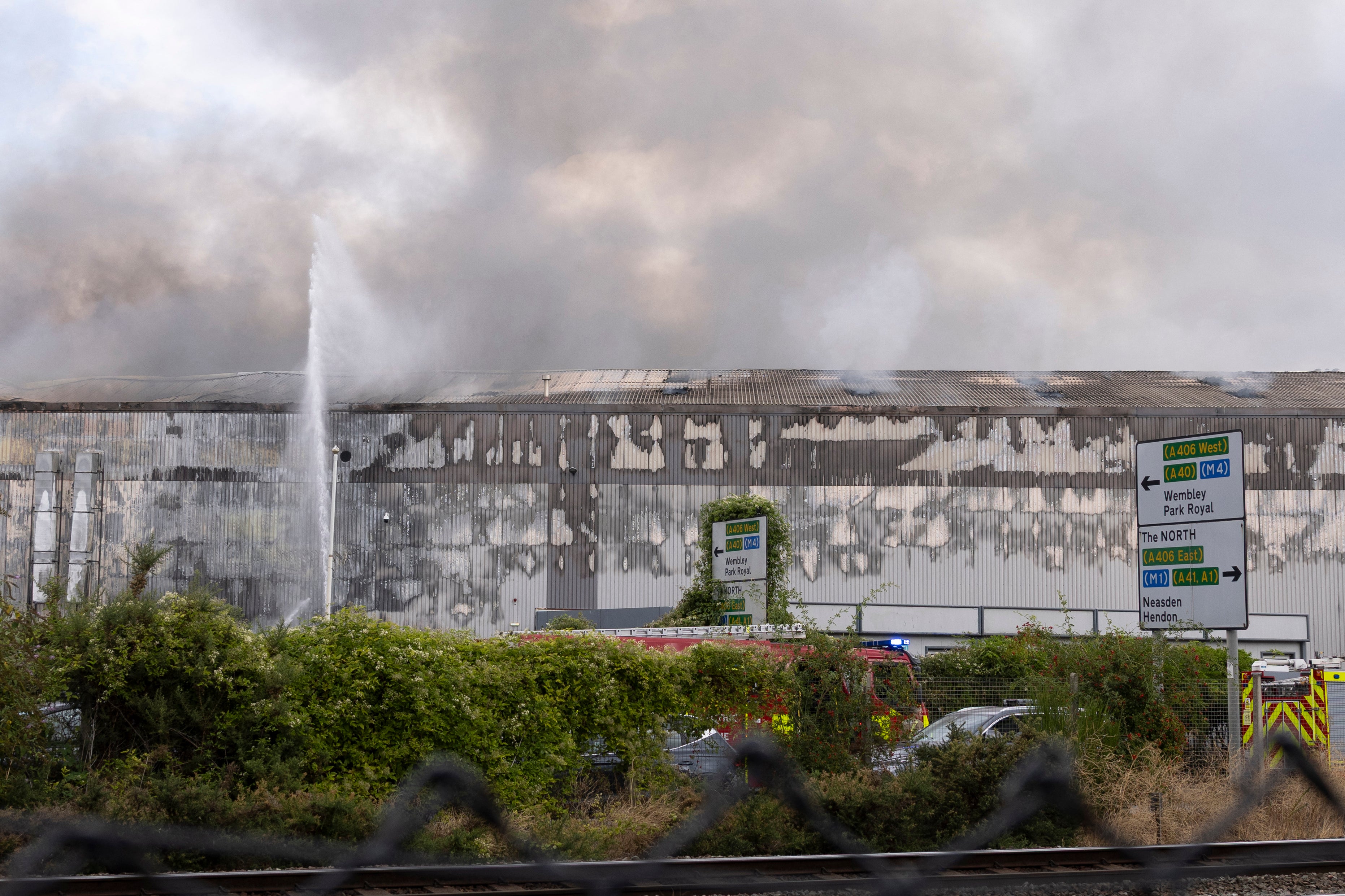 Firefighters are on the scene in Neasden (AFP/Getty)