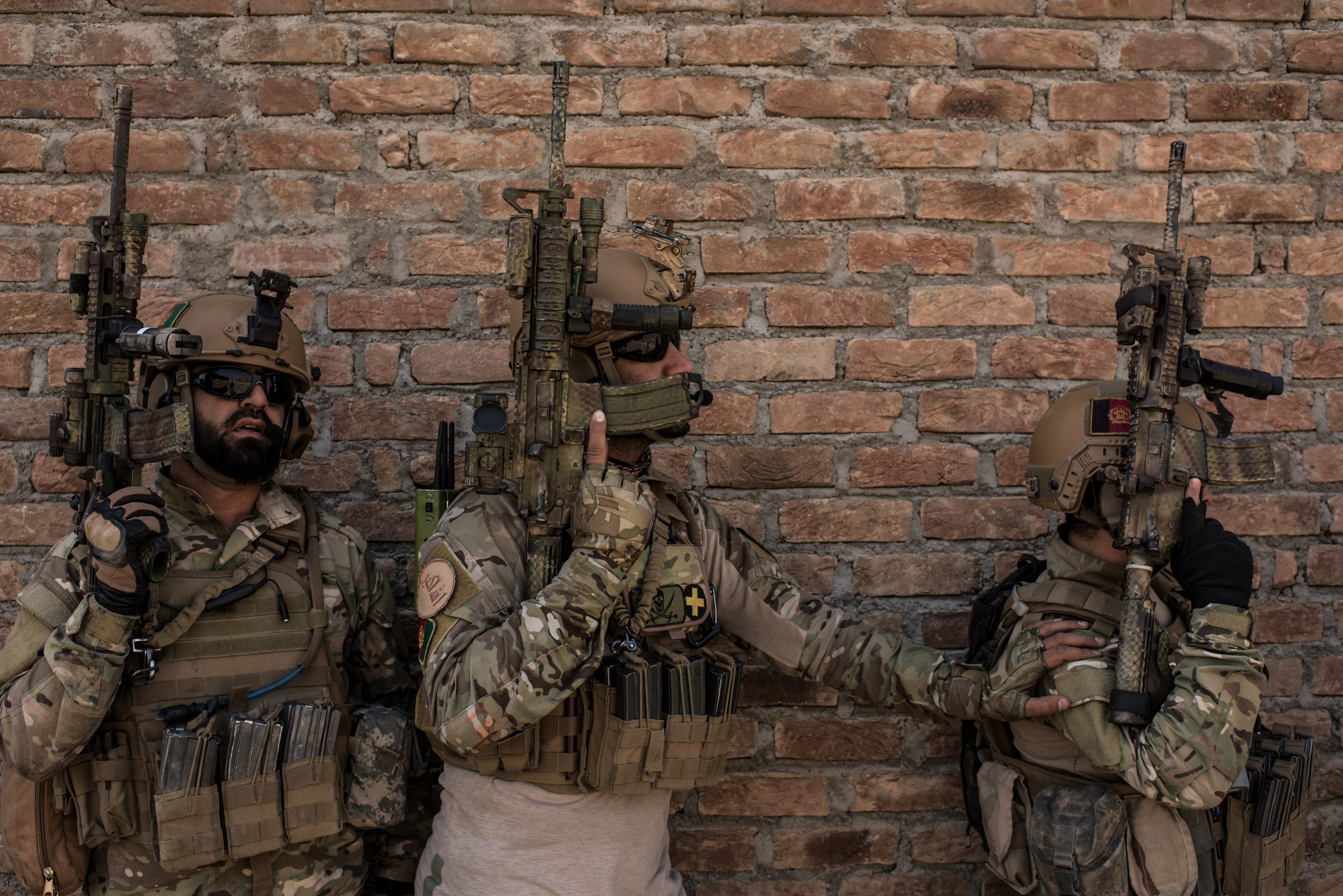 Members of Afghanistan's Crisis Response Unit 222, an Afghan Special Police Unit, participate in a training slowed down for the media on September 7, 2017 at Camp Lion in Kabul, Afghanistan.