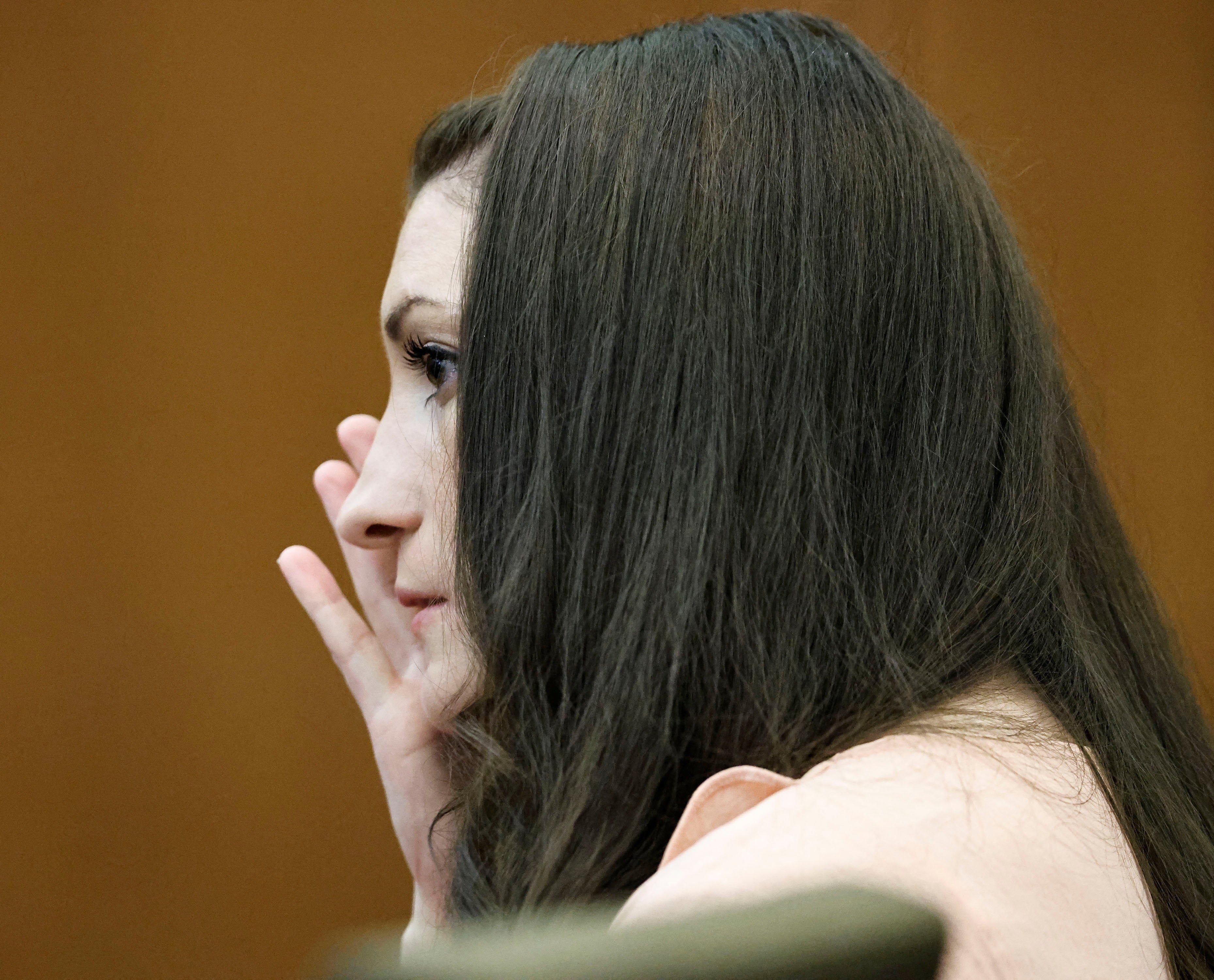 Lindsay Clancy wipes away tears as she listens to the testimony during her murder trial in Plymouth, Massachusetts