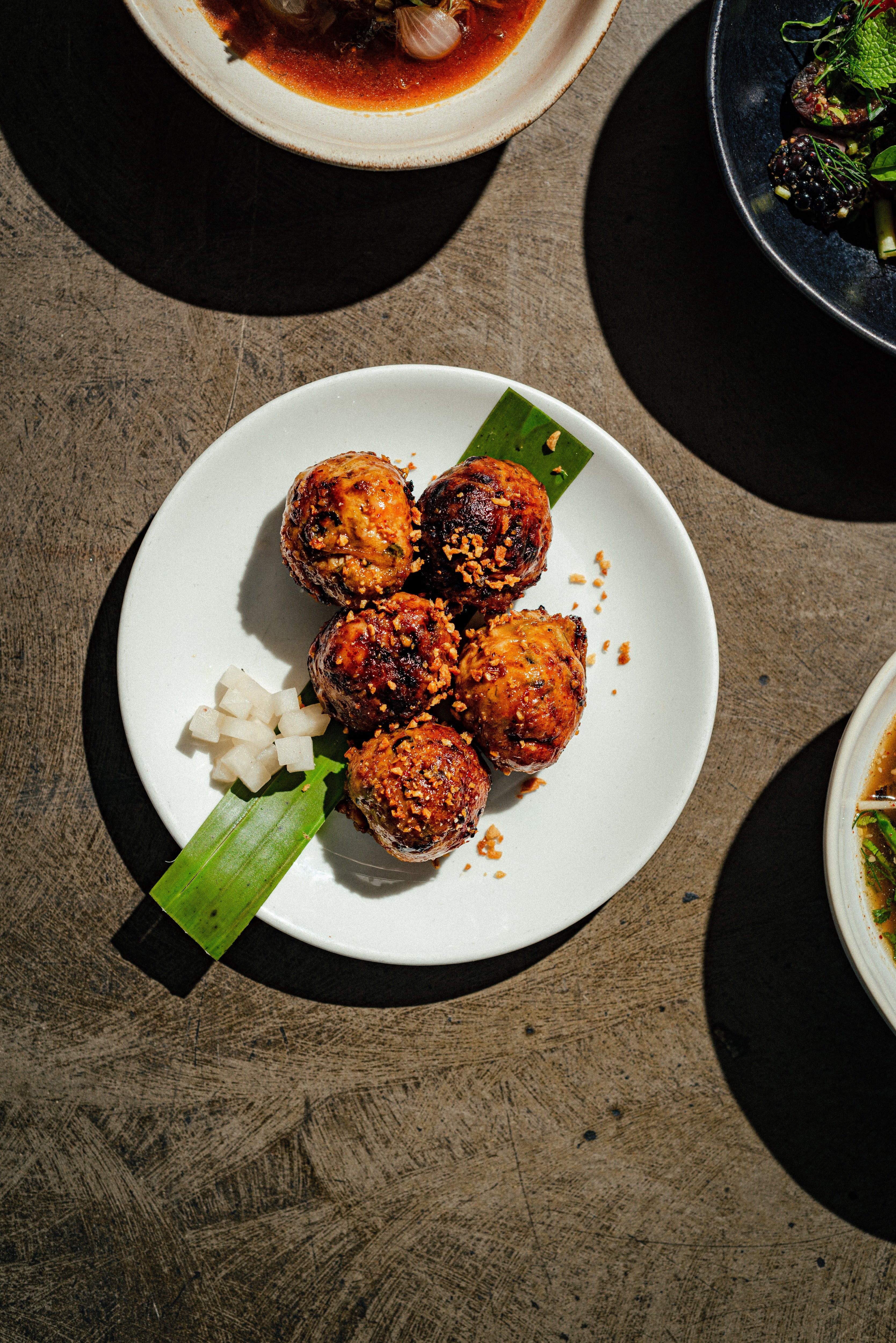 Shan-inspired meatballs with chilli, lemongrass and herbs, built for the barbecue