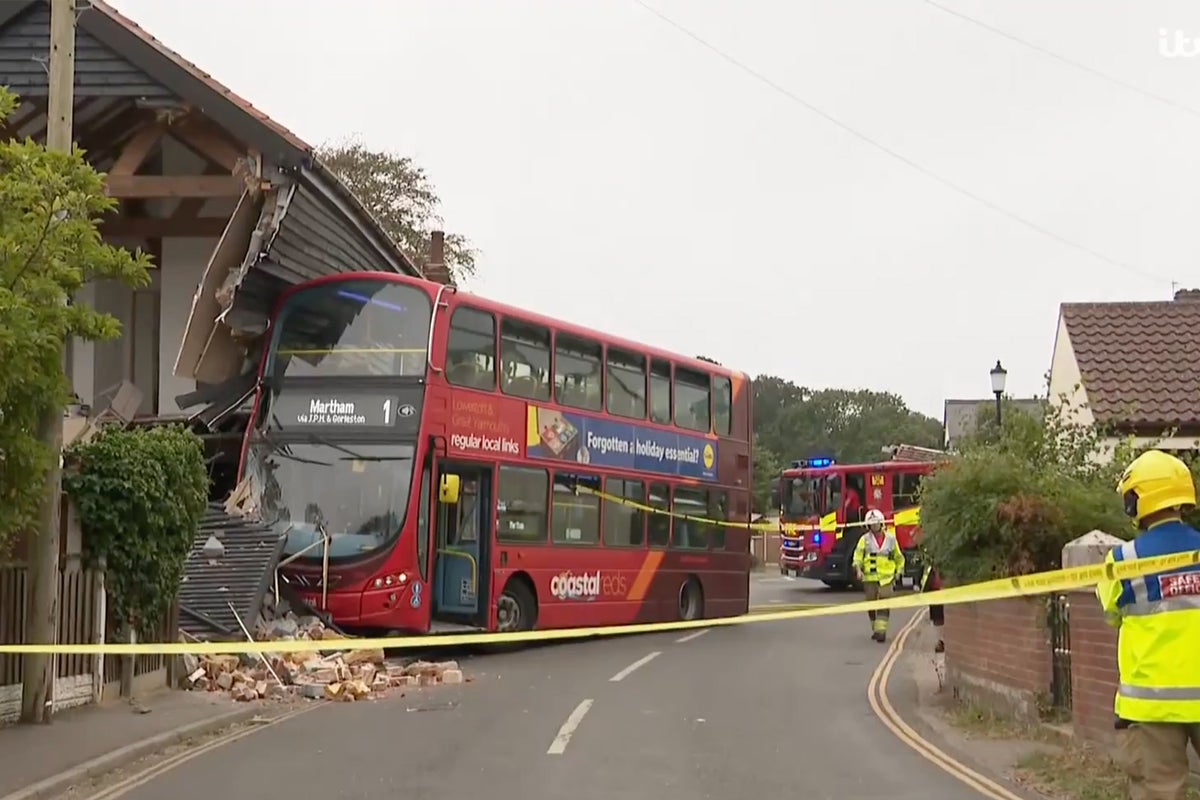 Double-decker bus crashes into period property leaving huge hole in house