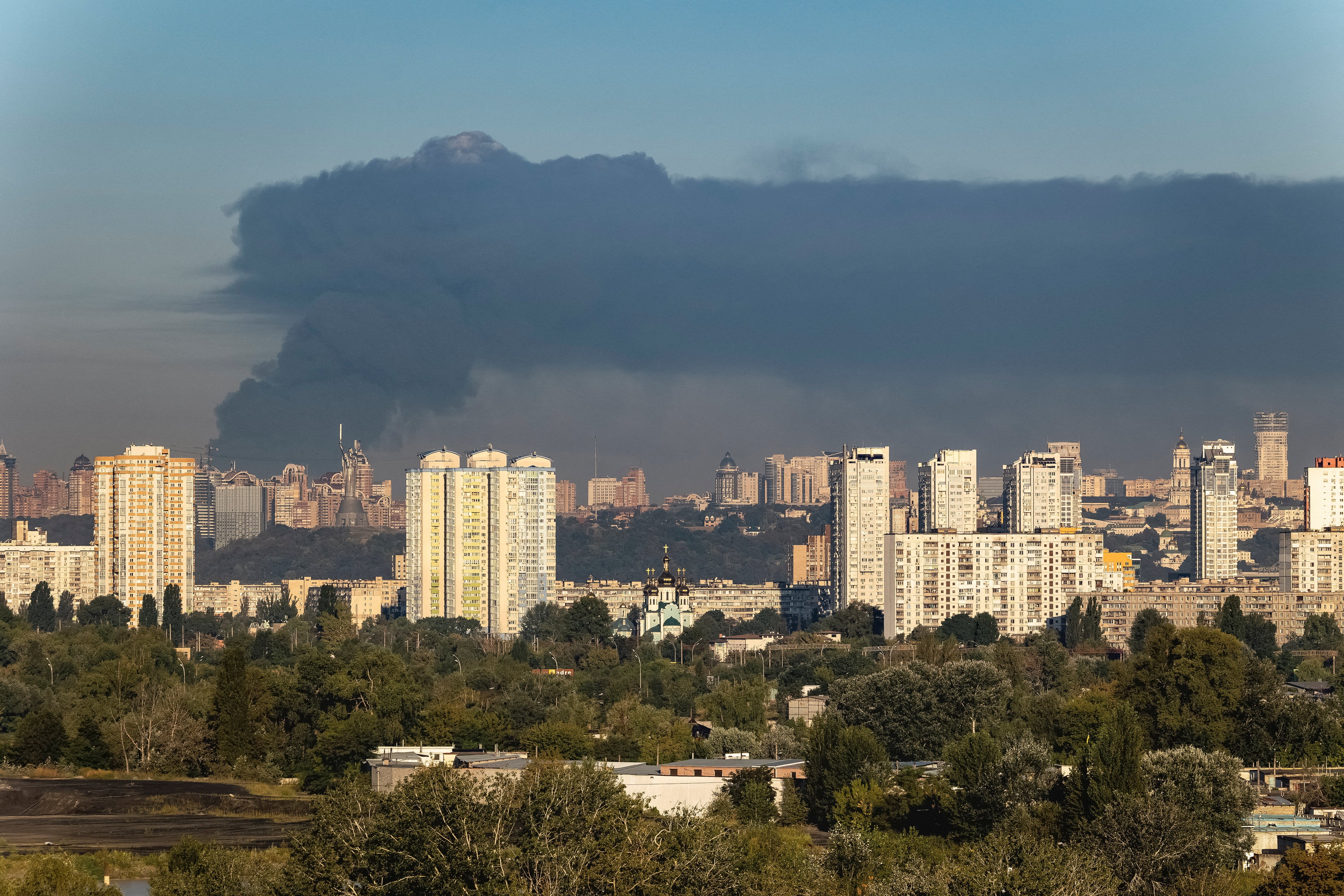 Smoke rises in the city during a Russian drone strike, amid Russia's attack on Kyiv