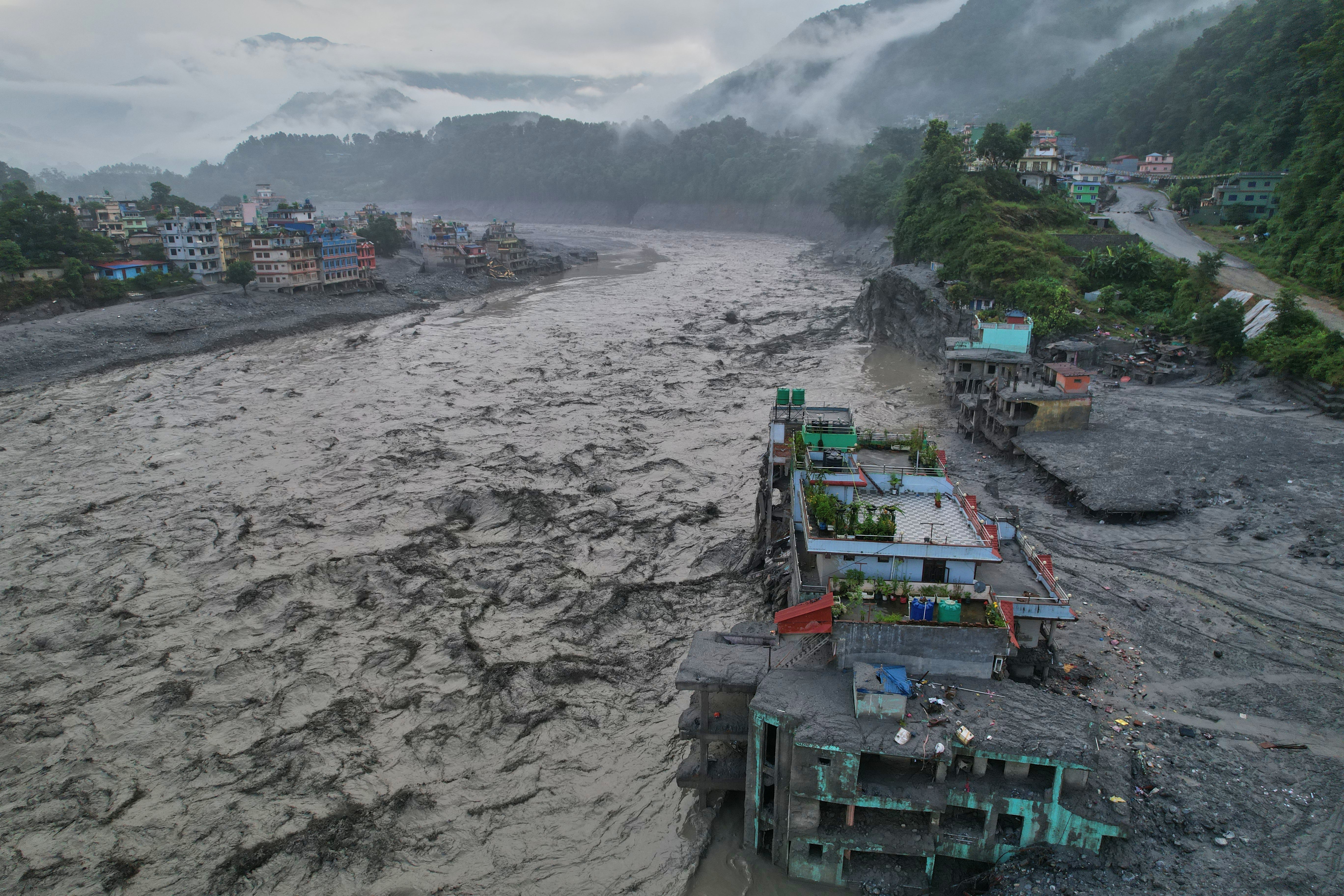 A drone view of the aftermath of flash flooding along the Trishuli river amidst fresh water surge warning in the Trishuli Bazaar area of Nuwakot district, Nepal