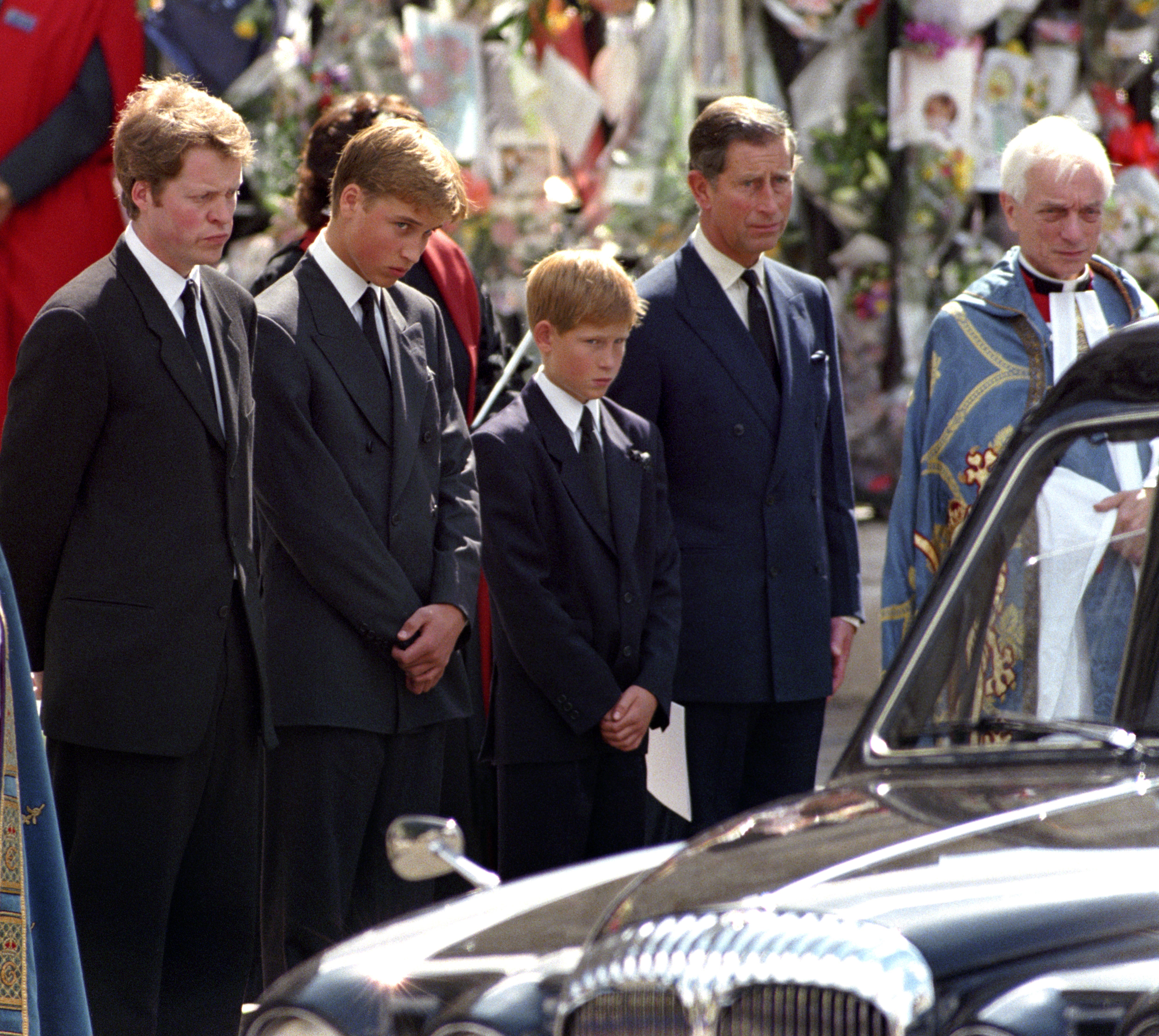 (Left to right) Earl Spencer, Prince William, Prince Harry and King Charles III, the then Prince of Wales, waiting as the hearse carrying the coffin of Diana, Princess of Wales prepares to leave Westminster Abbey following her funeral service