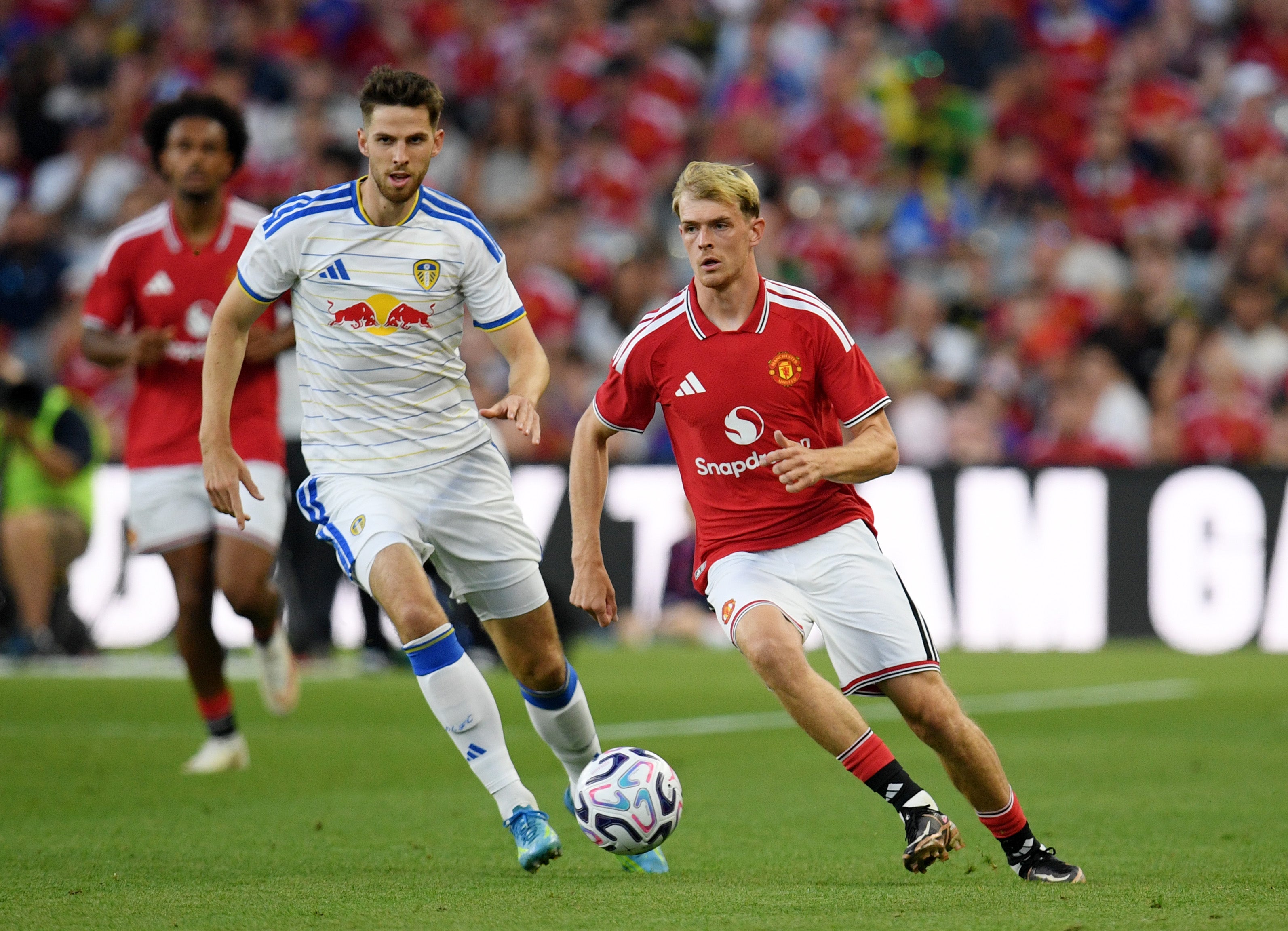 Toby Collyer of Manchester United runs with the ball during a pre-season friendly against Leeds United