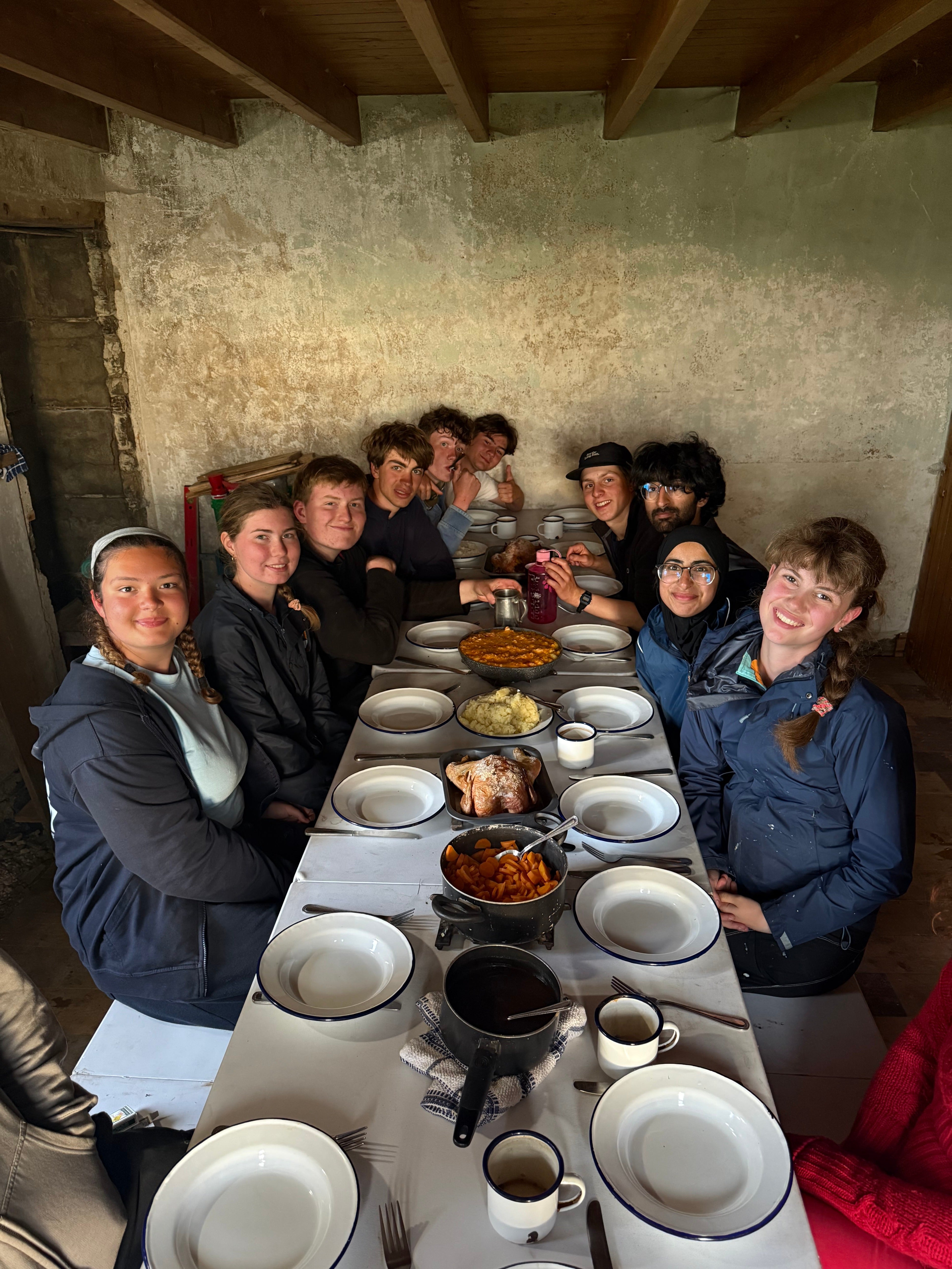 A group of students who discovered what is thought to be a medieval Viking church about 1,000 years old on an uninhabited Scottish island
