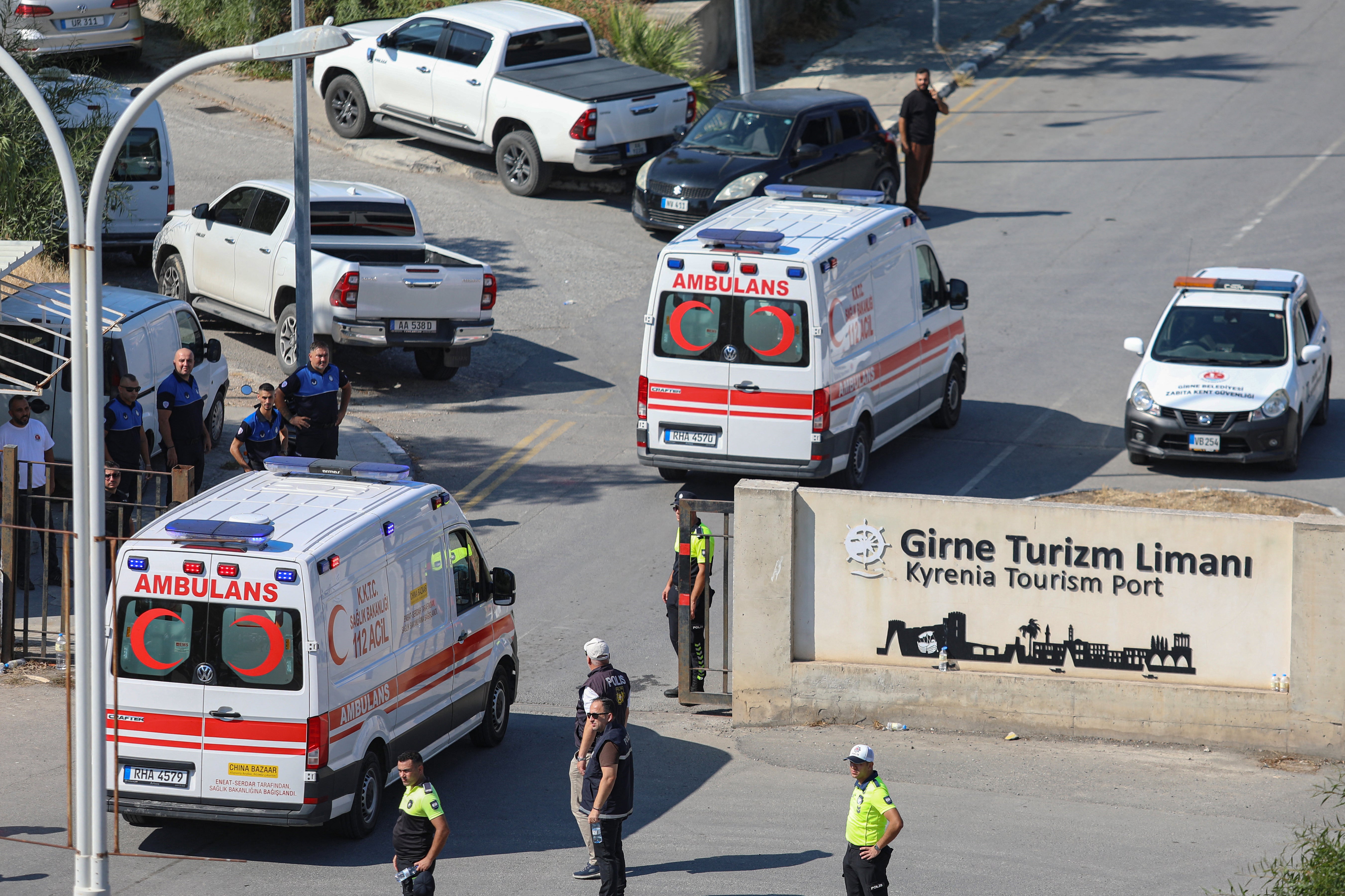 Survivors from the ferry that capsized off the coast earlier in the day are transferred by ambulaces to a hospital from the port in Kyrenia, in the self-proclaimed Turkish Republic of Northern Cyprus (TRNC), recognised only by Turkey, on August 30, 2026. (AFP/Getty)