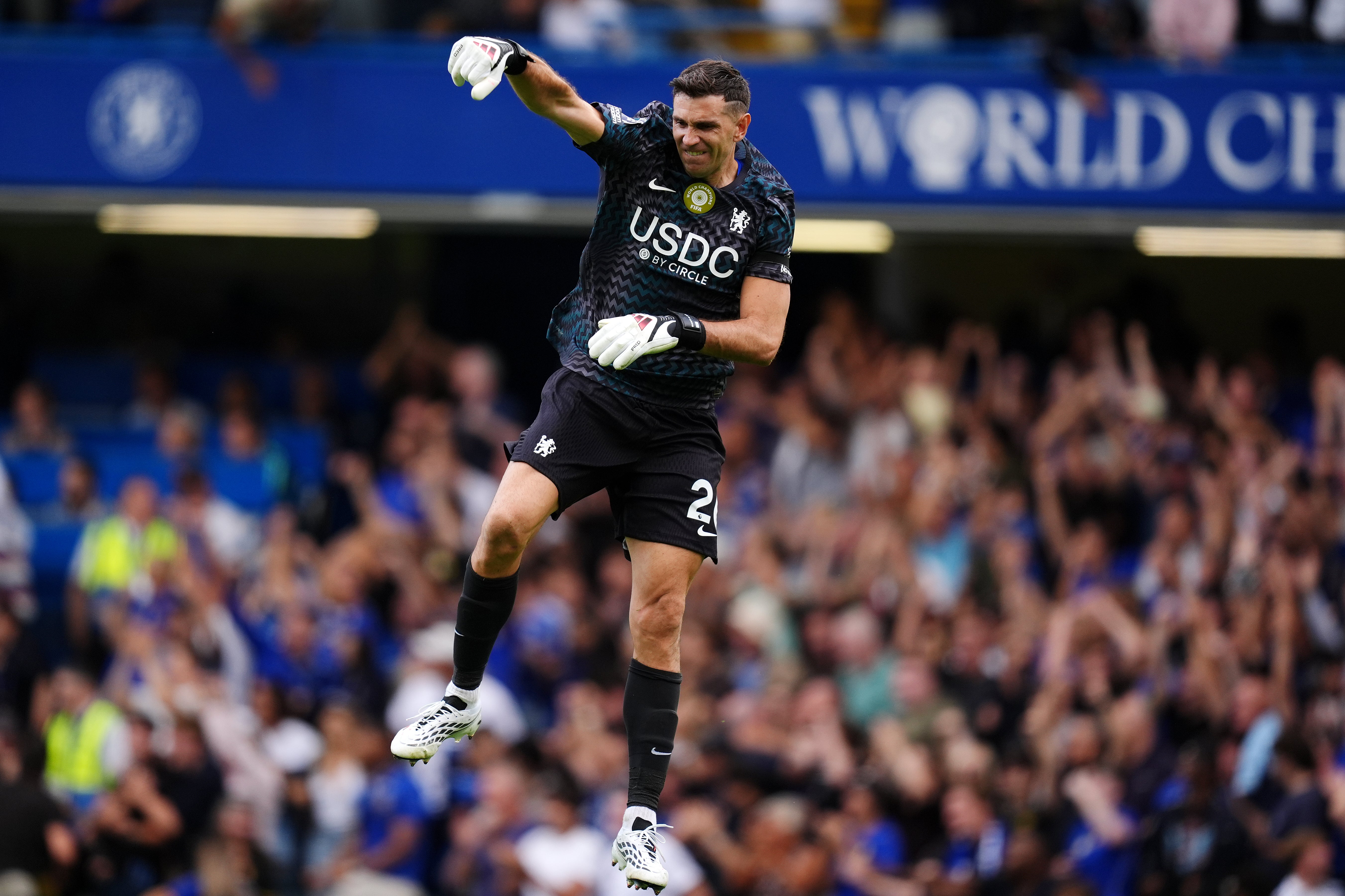 Deubant Emiliano Martinez celebrates Cole Palmer’s goal (PA Wire)