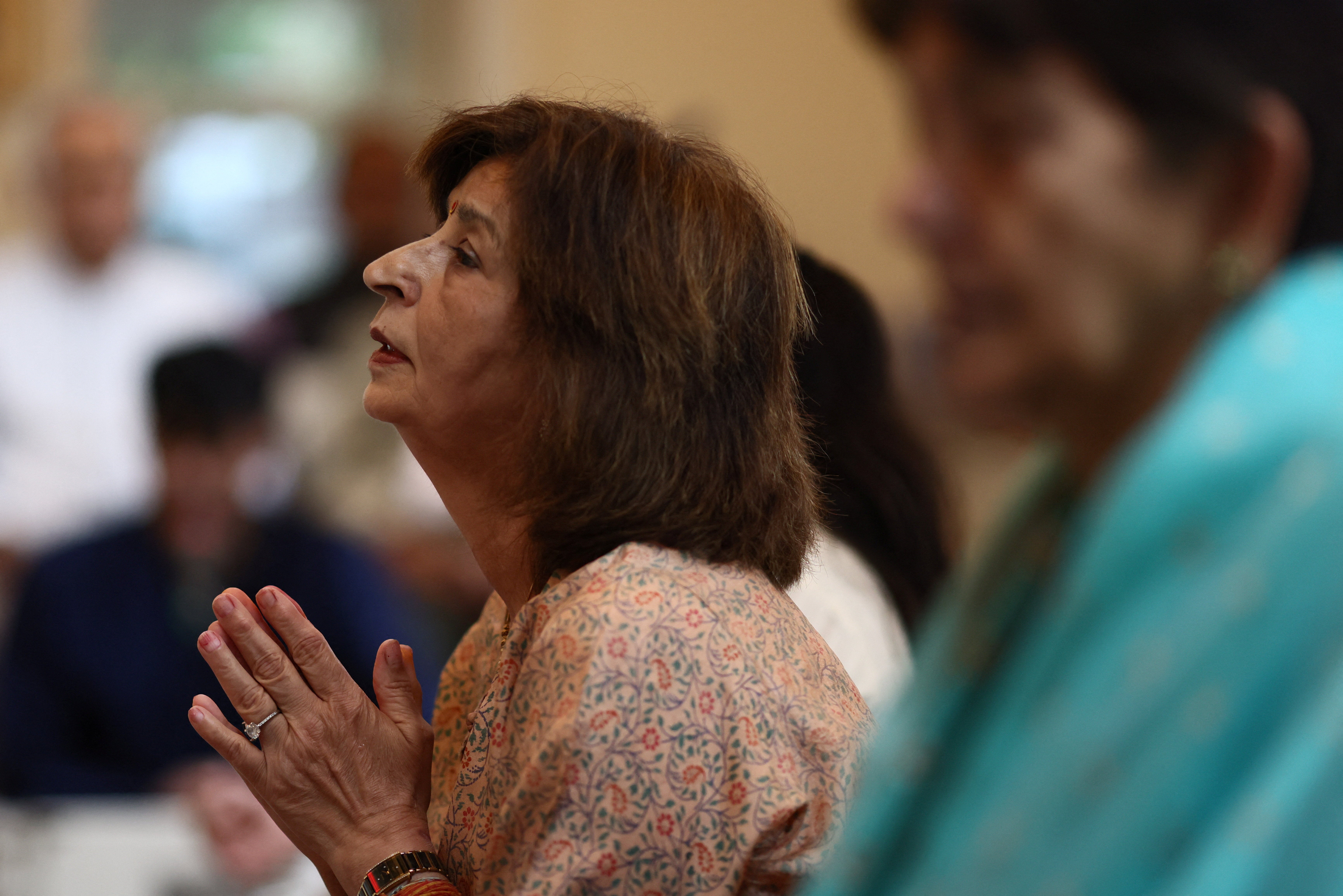 A member of the Nepali community attends special prayers at the South London Sanatan Mandir, as 16 people from the community centre remain missing following deadly flash floods and mudslides in Nepal, in Coulsdon, Britain, August 30, 2026.