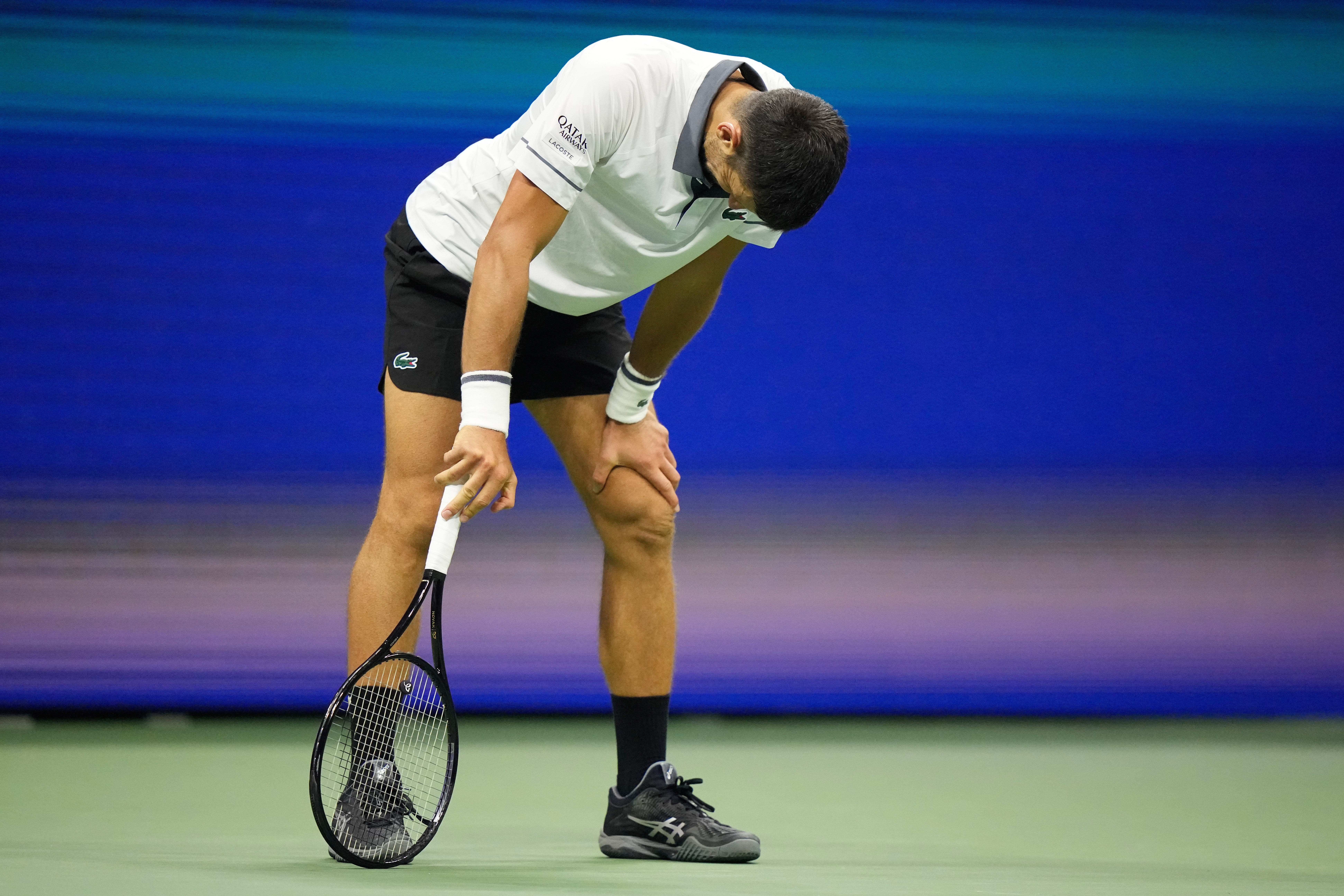 The 39-year-old was frequently doubled over in pain (Frank Franklin II/AP)
