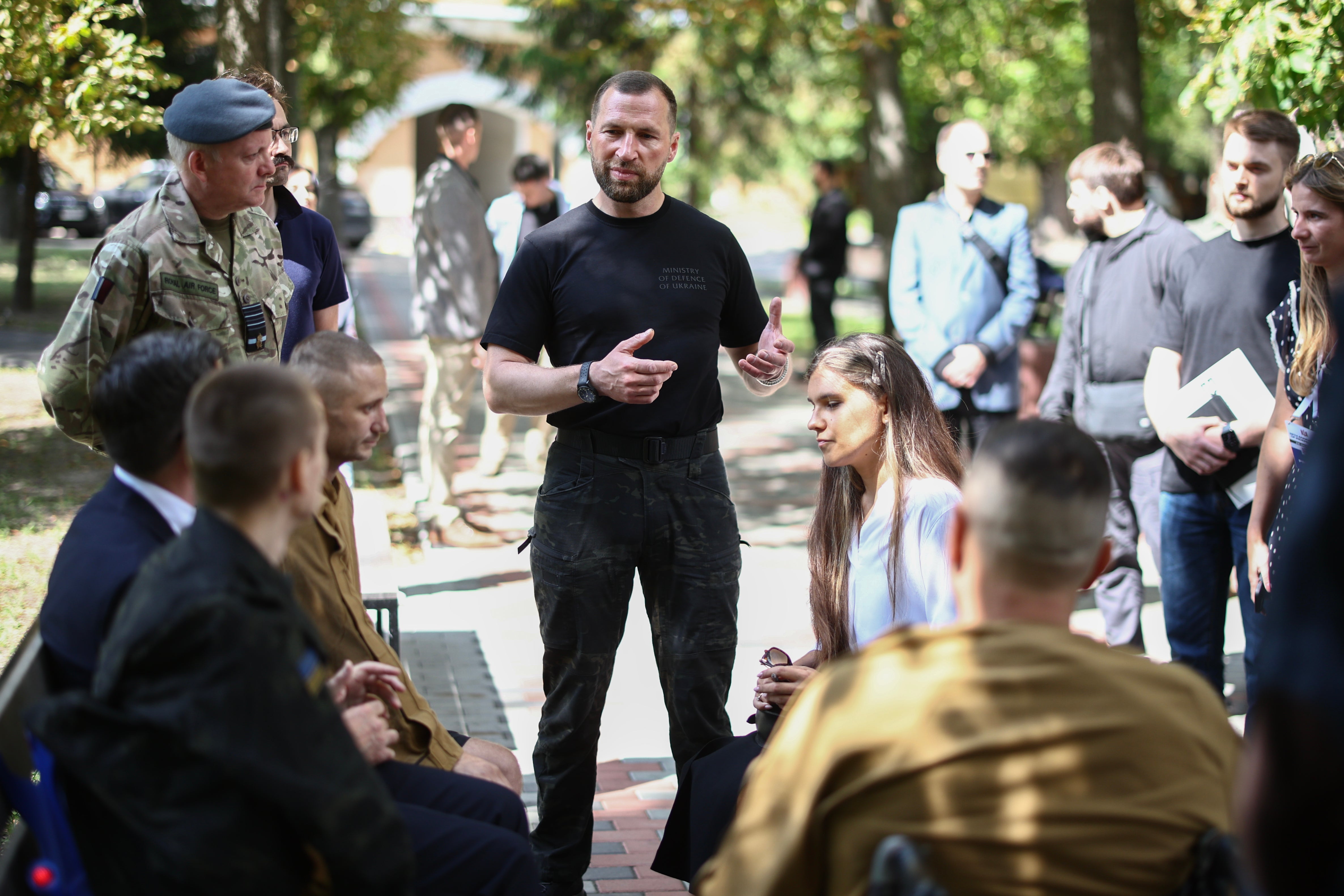 Ukraine's defence minister Yevgeniy Khmara talks to Britain's prime minister Andy Burnham during a meeting with patients wounded in the war at the Main Military Hospital in Kyiv