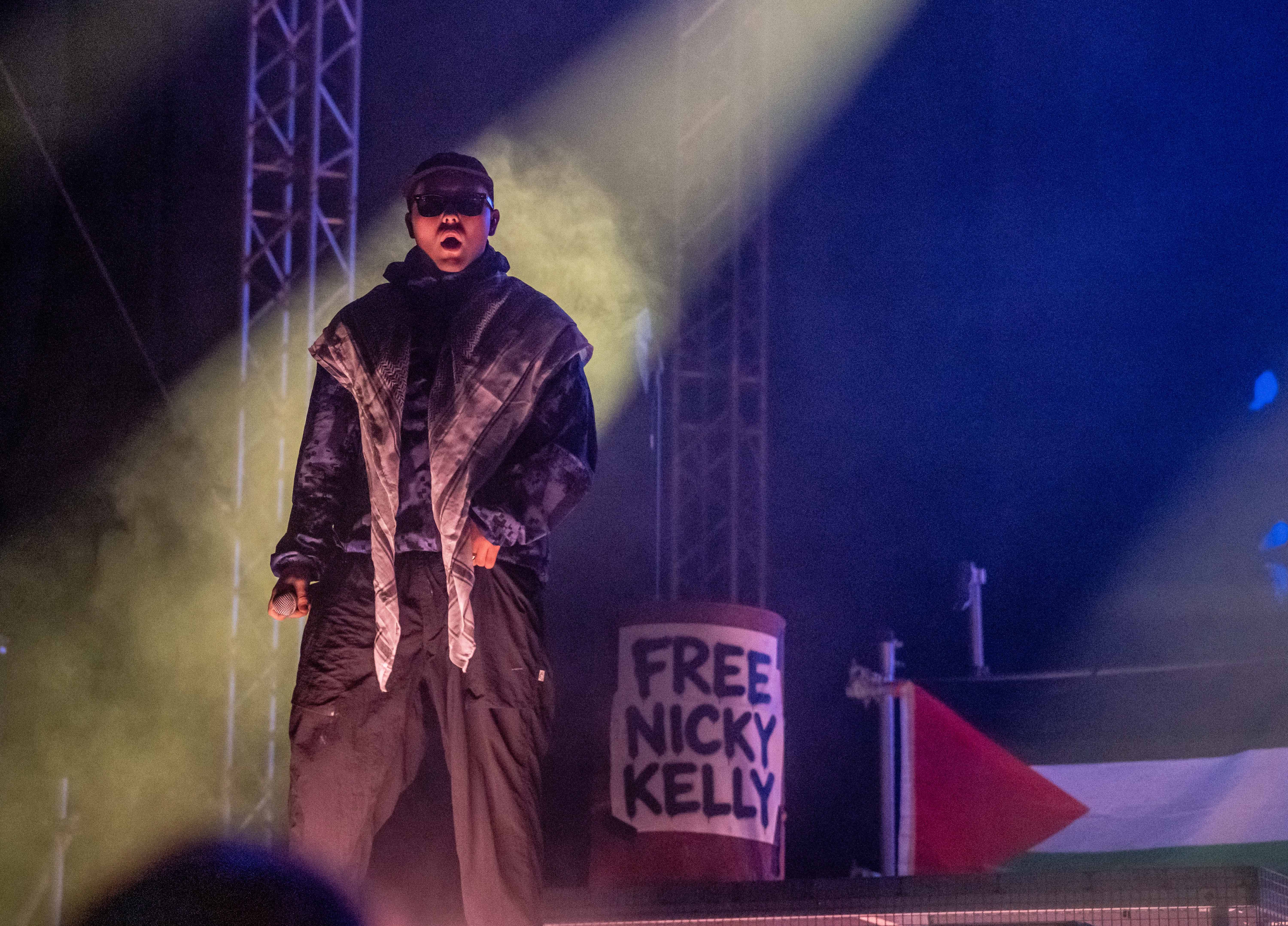 Closing their set, Kneecap performed THE RECAP, their 2025 track which confronts the media scrutiny and political backlash the band faced for their pro-Palestine stance and police investigations