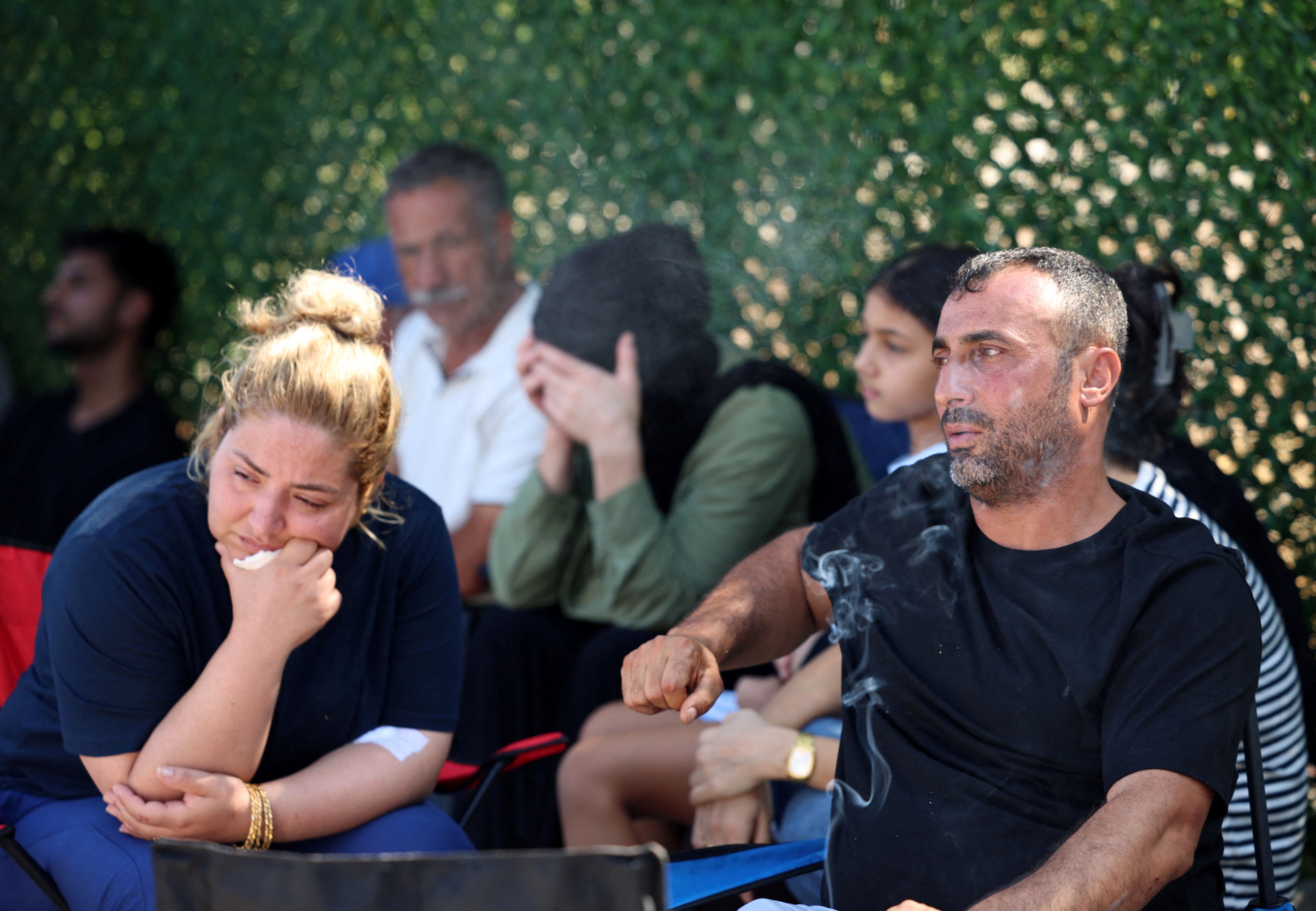 Ayten Bicer and Hayri Bicer, whose two children are missing after a passenger boat capsized off the coast of Kyrenia, wait for an update outside Kyrenia port, in Turkish-controlled northern Cyprus, August 31, 2026
